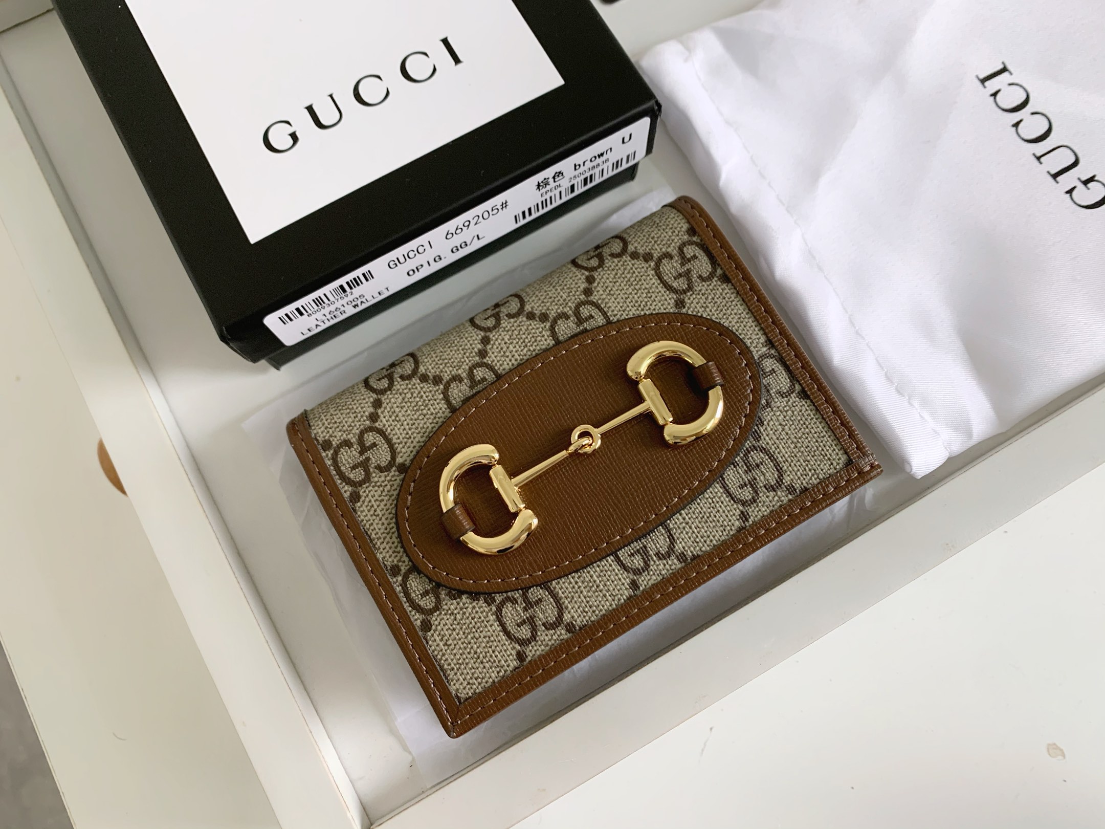 Gucci 1955馬衔扣カードケース - GG Supremeと高級皮革のコンビネーション