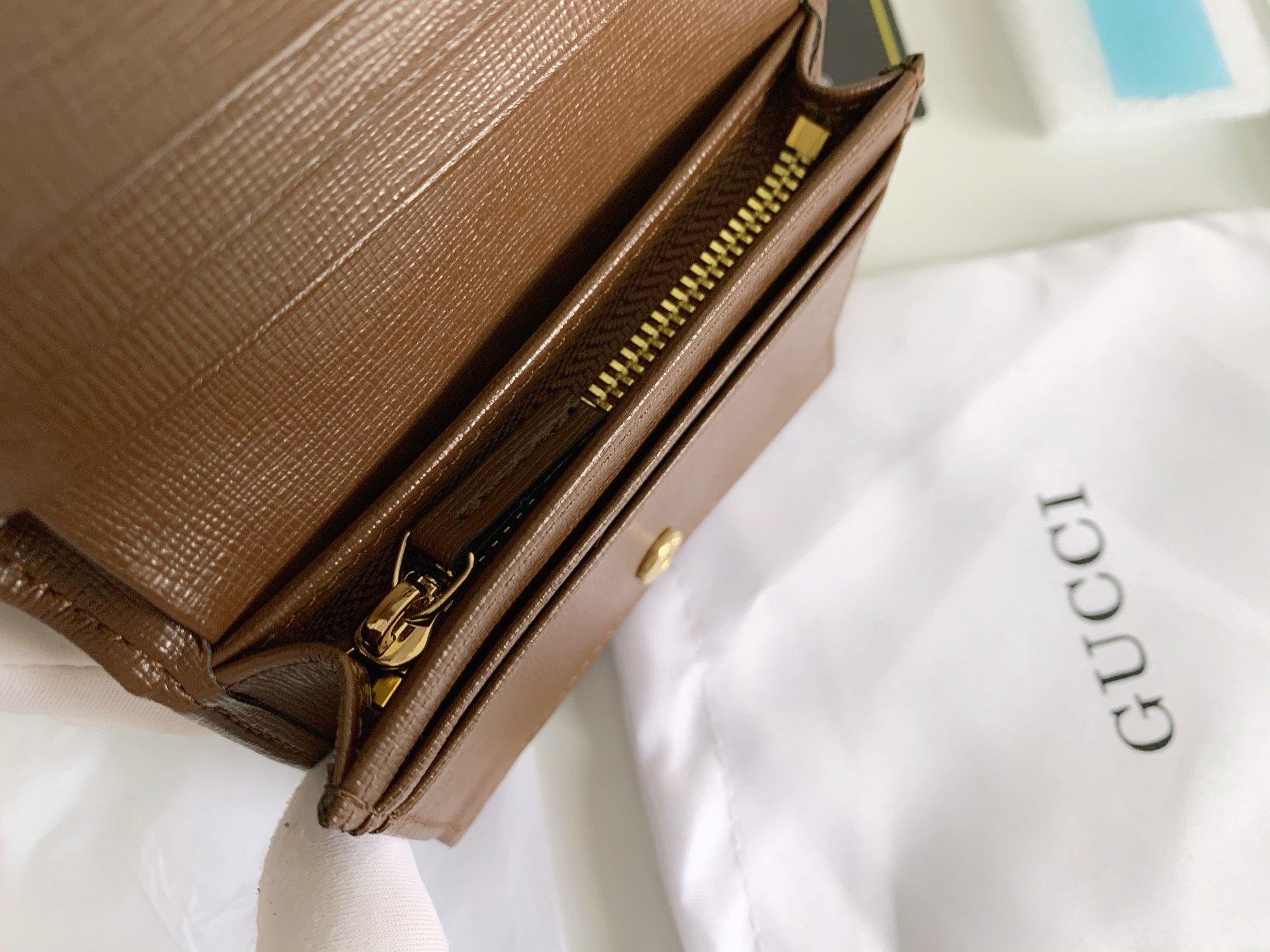 Gucci 1955馬衔扣カードケース - GG Supremeと高級皮革のコンビネーション