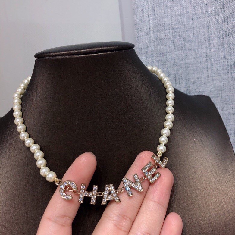 chanel pearl letter logo necklace