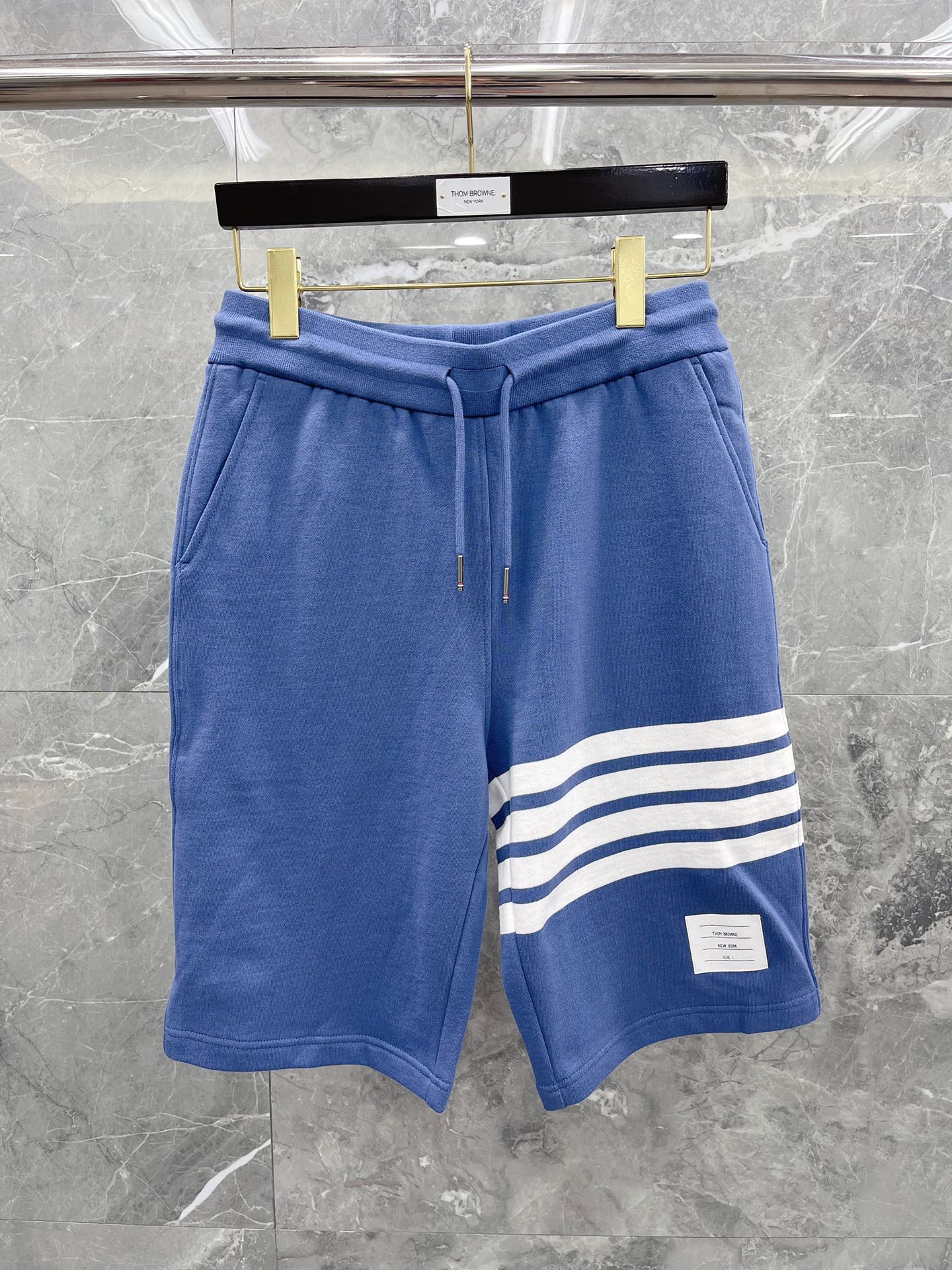 톰브라운 4선 코튼 오버핏 반바지 남녀공용 40427 Thom Browne Shorts