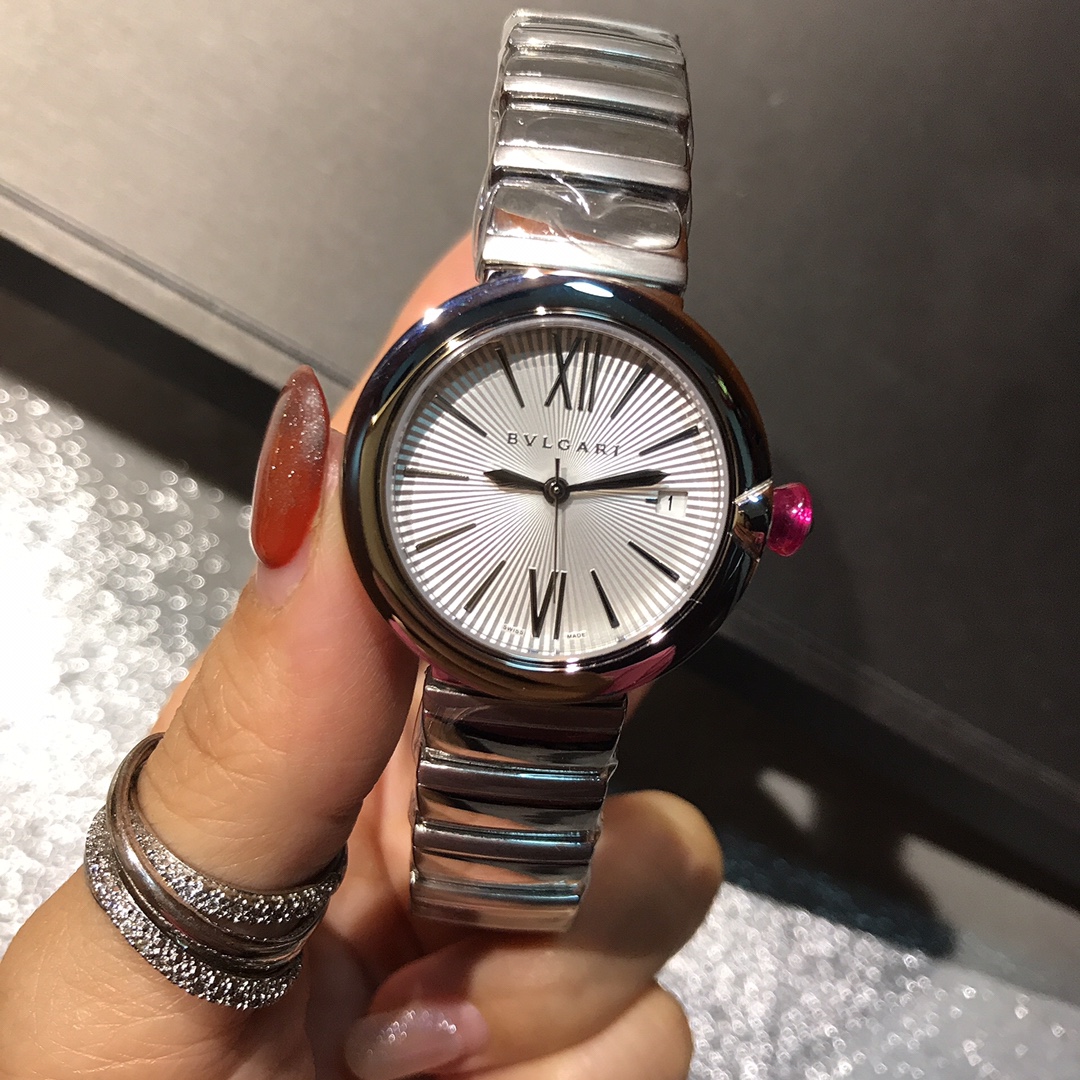 Bulgari Lvcea steel case, silver dial, steel bracelet, pink cabochon bezel 33mm Women's Quartz