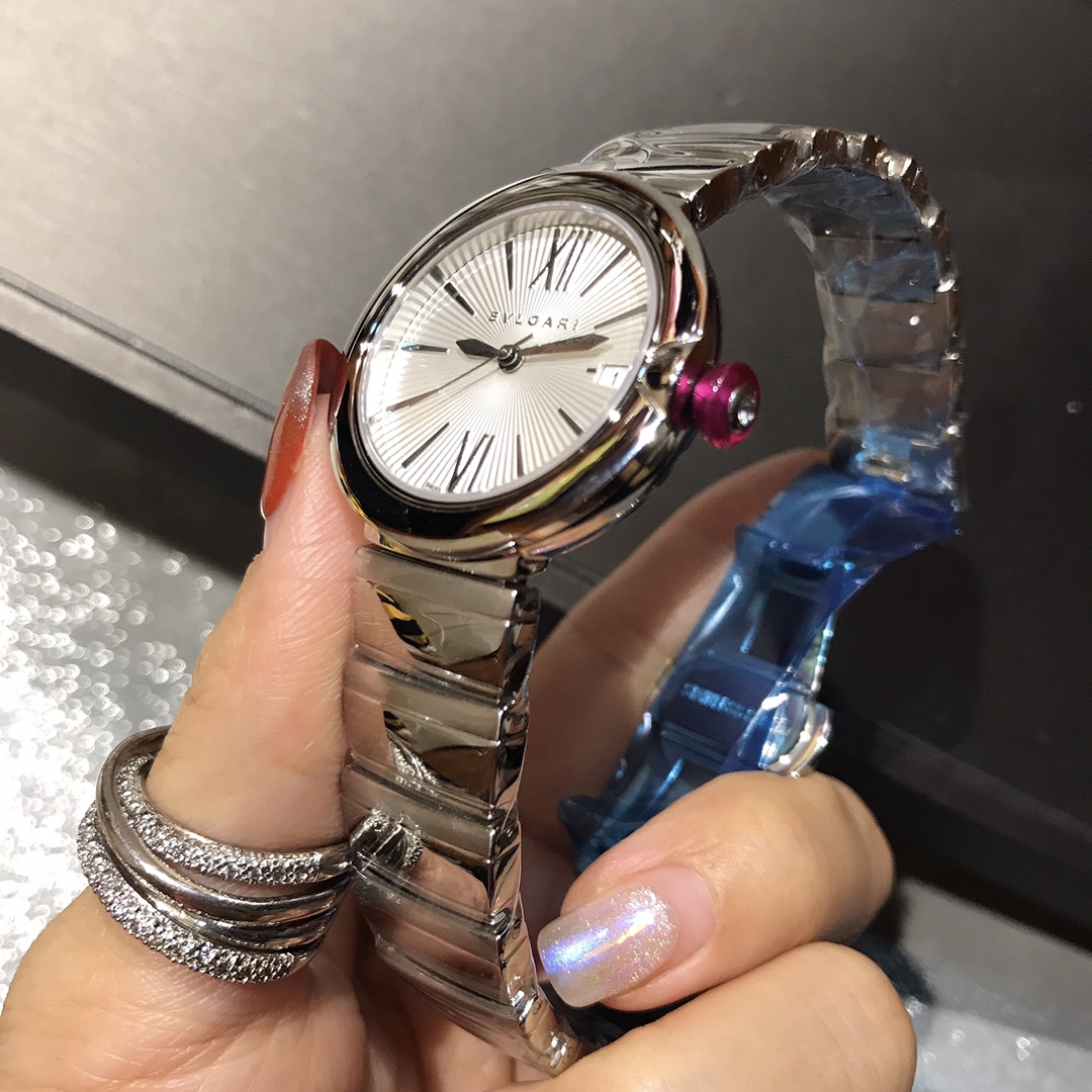 Bulgari Lvcea steel case, silver dial, steel bracelet, pink cabochon bezel 33mm Women's Quartz