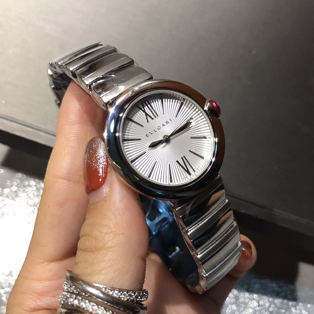 Bulgari Lvcea steel case, silver dial, steel bracelet, pink cabochon bezel 33mm Women's Quartz