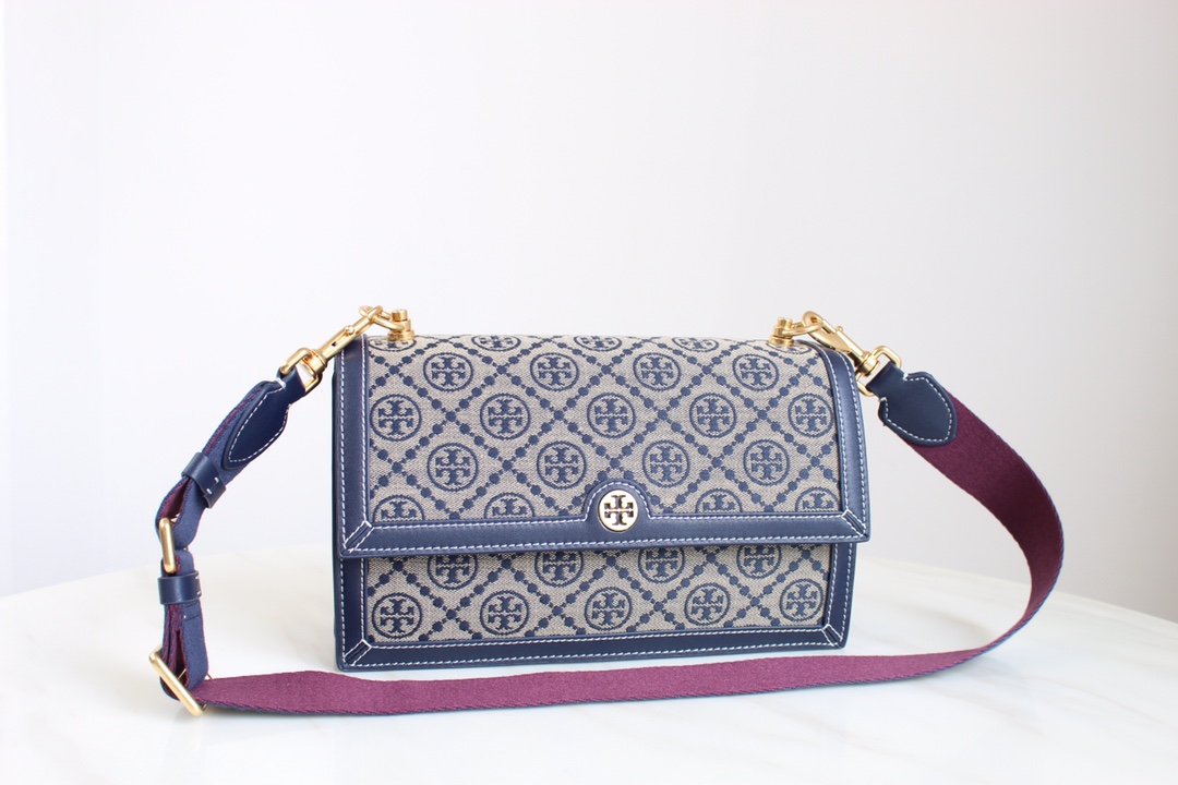 Tory Burch 大号——Tory burch2021春夏 风琴包 设计灵感源自德高宾夕法尼亚人传统缝工艺的 图案