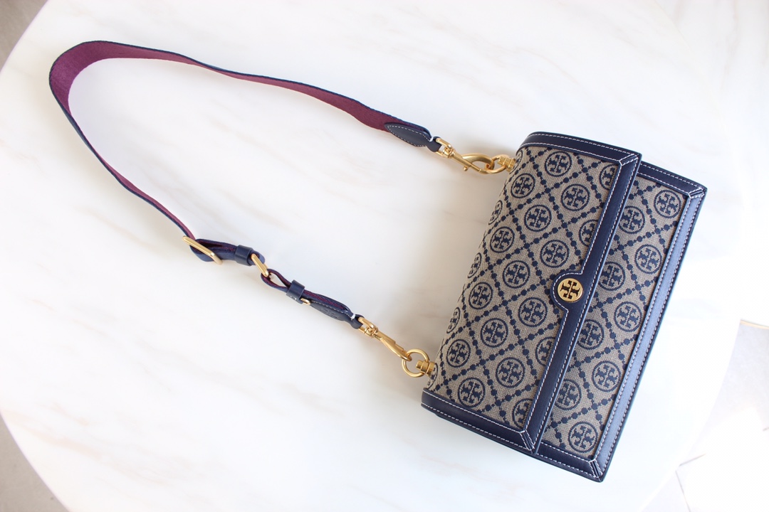 Tory Burch 大号——Tory burch2021春夏 风琴包 设计灵感源自德高宾夕法尼亚人传统缝工艺的 图案