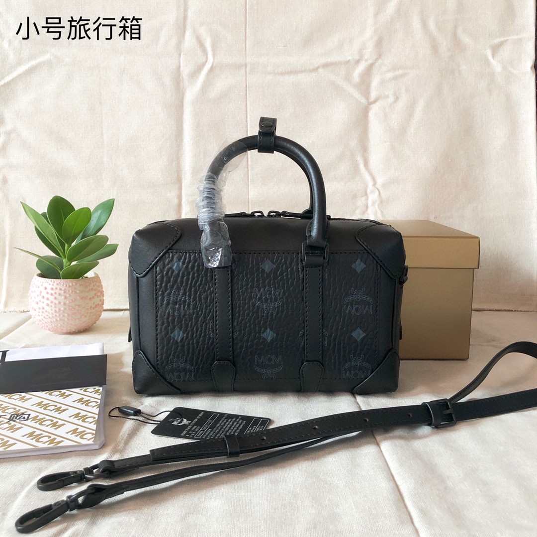 Top quality item 💐 New MCM Soft Berlin crossbody bag is meticulously crafted, offering a miniaturized interpretation of the classic travel trunk. Leather details outline the edges of the iconic Visetos body, while painted corners highlight the craftsmanship. Dual zipper closure ensures security. Can be carried by hand or worn crossbody. Dimensions 14.0 x 21.5 x 8.0 cm. Features detachable adjustable leather shoulder strap, classic Visetos pattern, dual zipper closure, top leather handle, interior zipper pocket and pockets, matte black hardware, fabric lining, and metal protective feet. image 1
