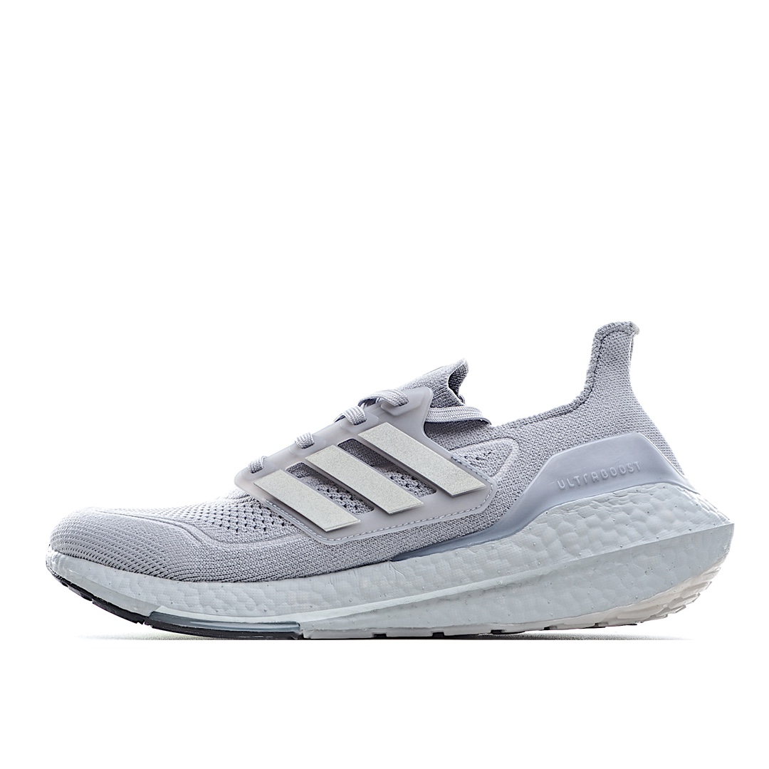 H0 纯原巴斯夫 阿迪达斯 Adidas UB7.0 爆米花 前凸后翘的adidas ultra boost 2021系列正式曝光，新一代的ulrtra boost 21在中底的部分添加了更多的boost材质面积，除了部分标志性的细节处外，这次更新的款式以前凸后翘的流线型呈现。中底的支撑片也变成了造型奇特的U型，鞋子设计十分有速度感。