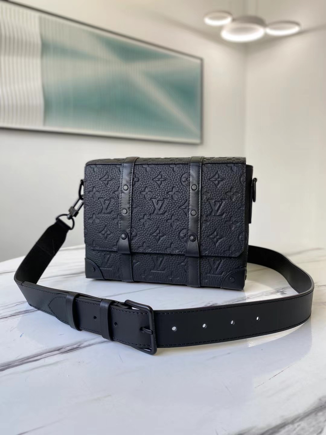 rectangular Trunk Messenger bag is crafted from Monogram-embossed - Bag