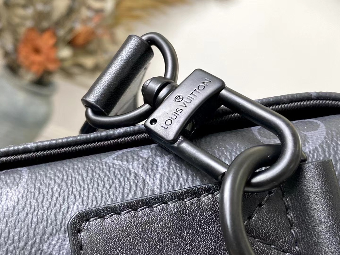 rectangular Trunk Messenger bag is crafted from Monogram Eclipse canvas - Bag 6