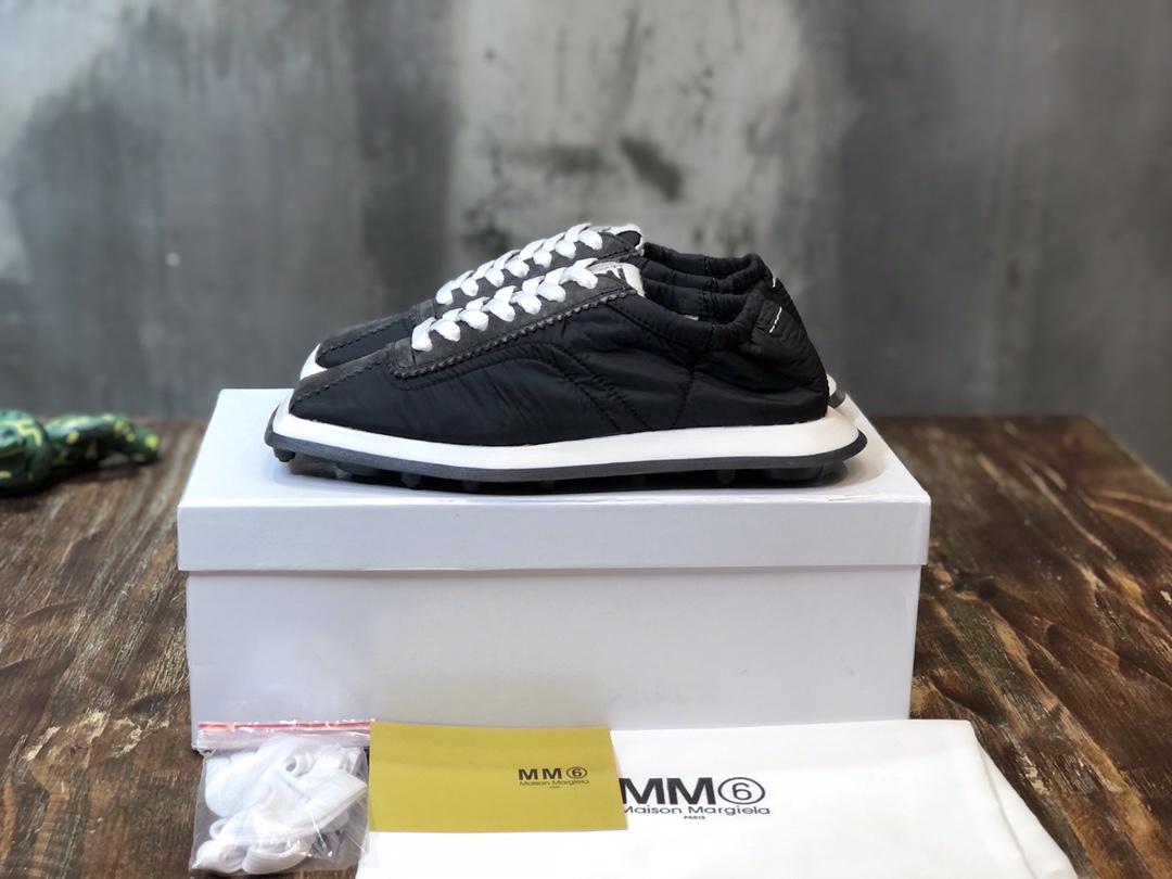 Maison Margiela Black Leather and Fabric Runner Sneakers for Women 1 i1623054609 2266 0