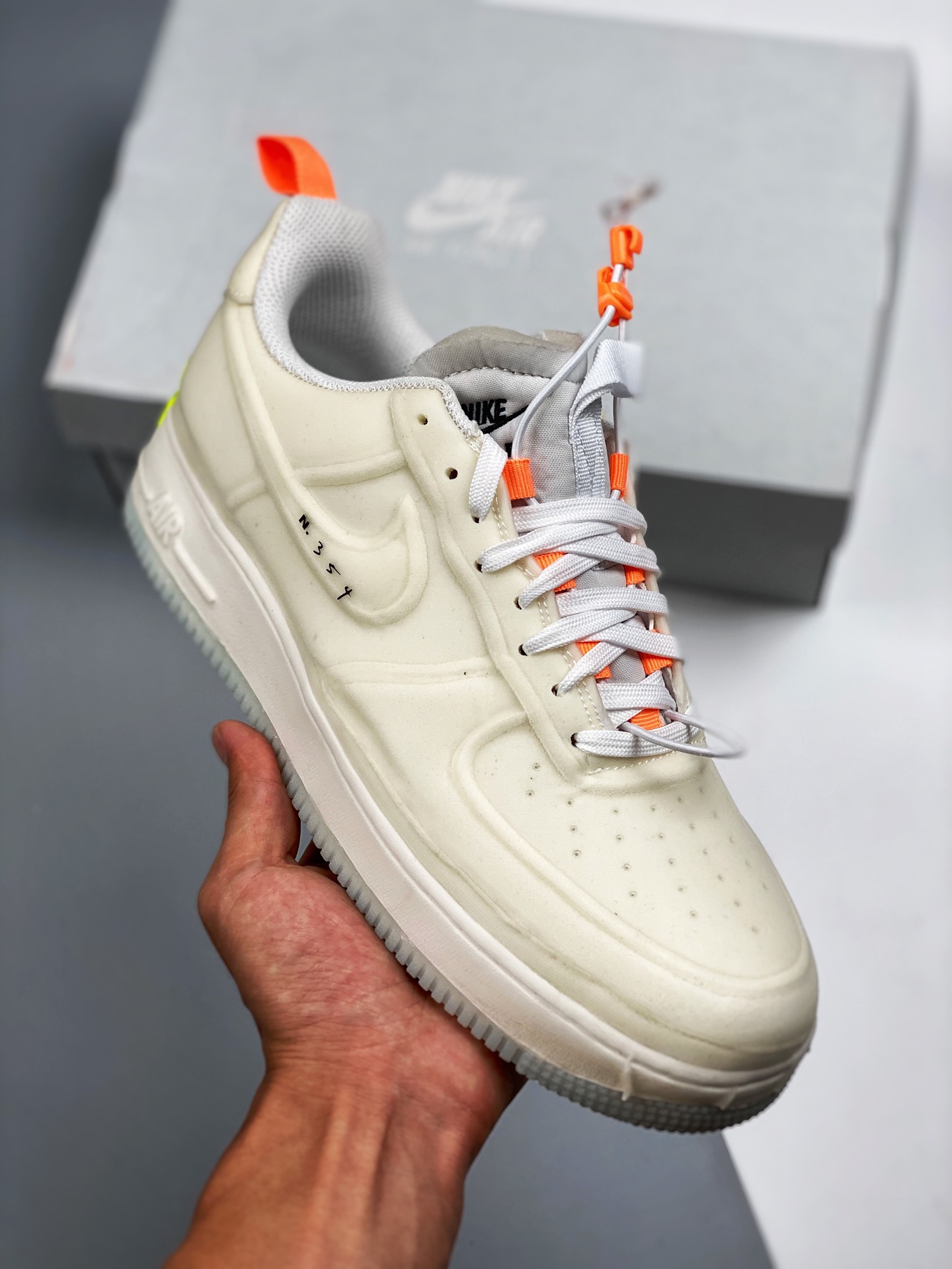 Air Force 1 Low "Sail" blanco marfil y naranja, horma original y cartón original, estilo puro de la Fuerza Aérea, enfoc…