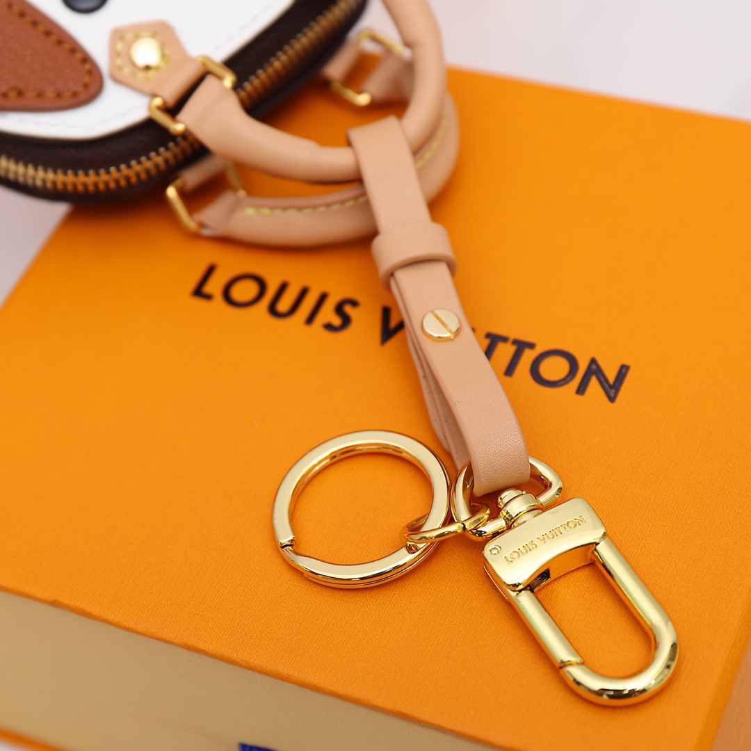 Miniature shell keychain attached to a purse