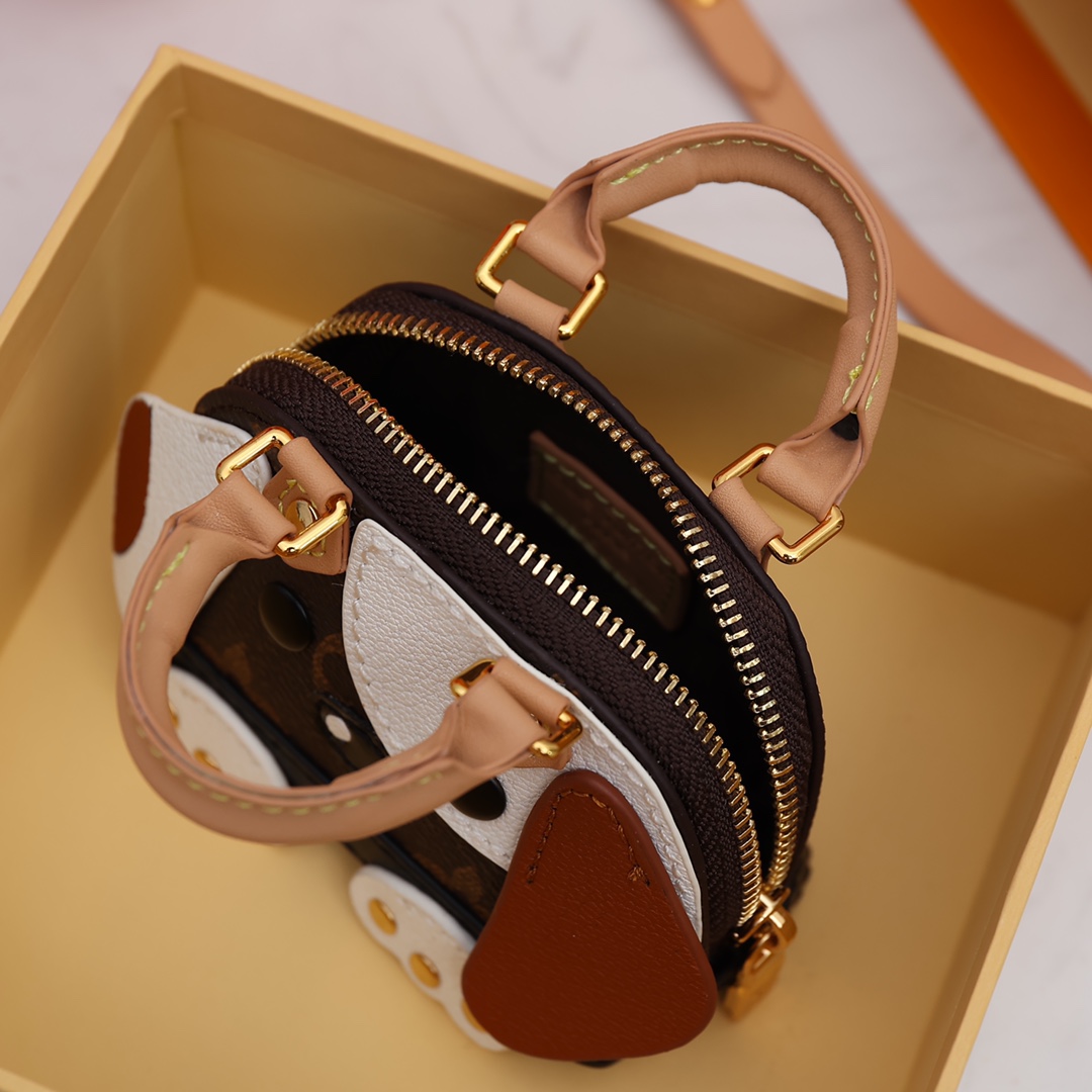 Close-up shot of the detailed stitching on the shell keychain