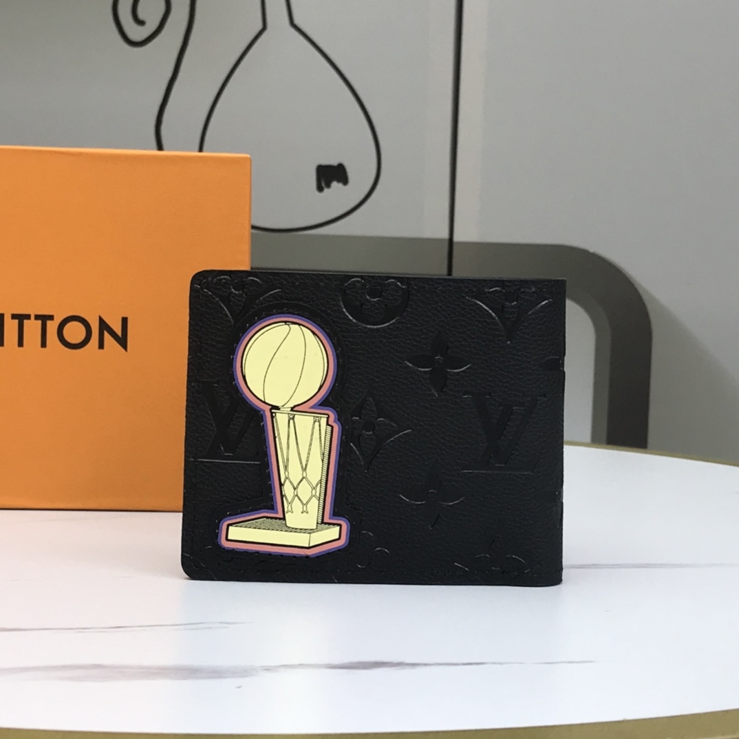 Open view of a bifold leather wallet, showing card slots and cash compartment