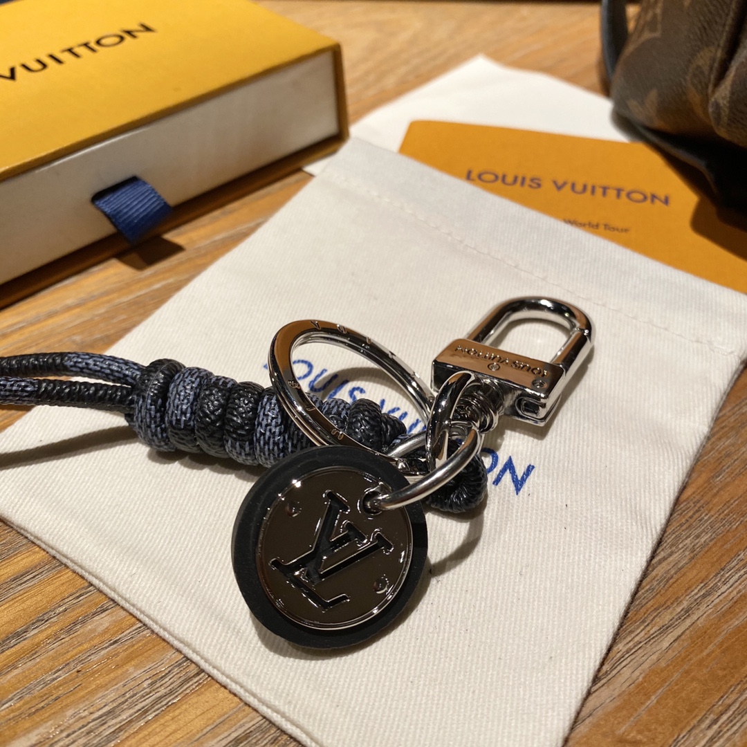 Hand holding the luxury leather rope keychain
