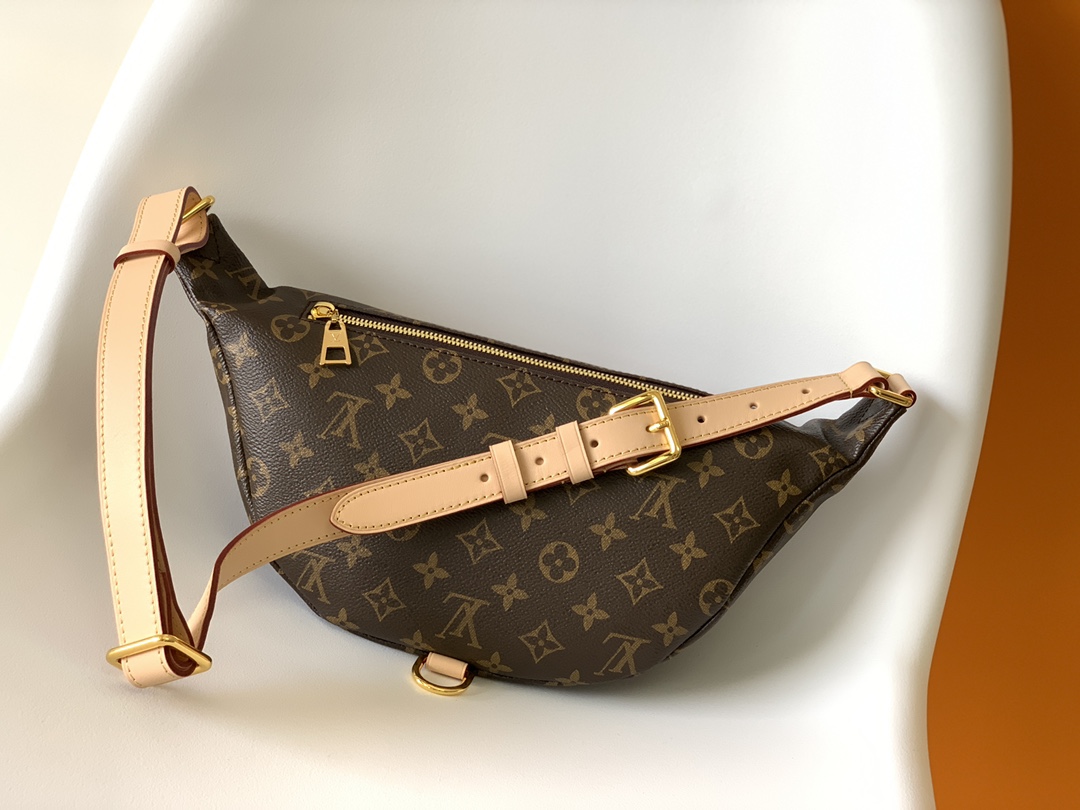 Crafted from classic Monogram canvas and accented with a "Louis Vuitton - Bag 3