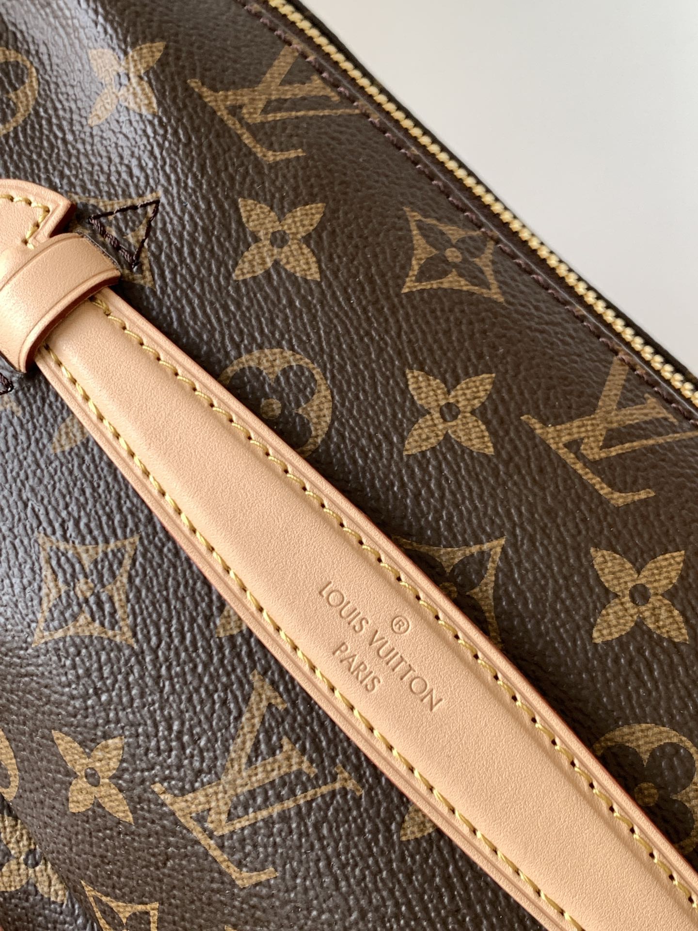 Crafted from classic Monogram canvas and accented with a "Louis Vuitton - Bag 6