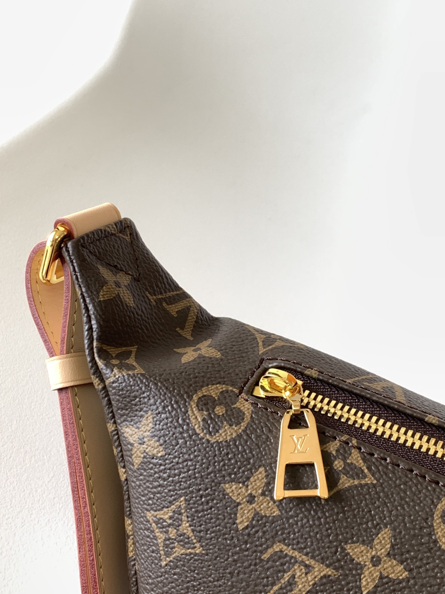 Crafted from classic Monogram canvas and accented with a "Louis Vuitton - Bag 7