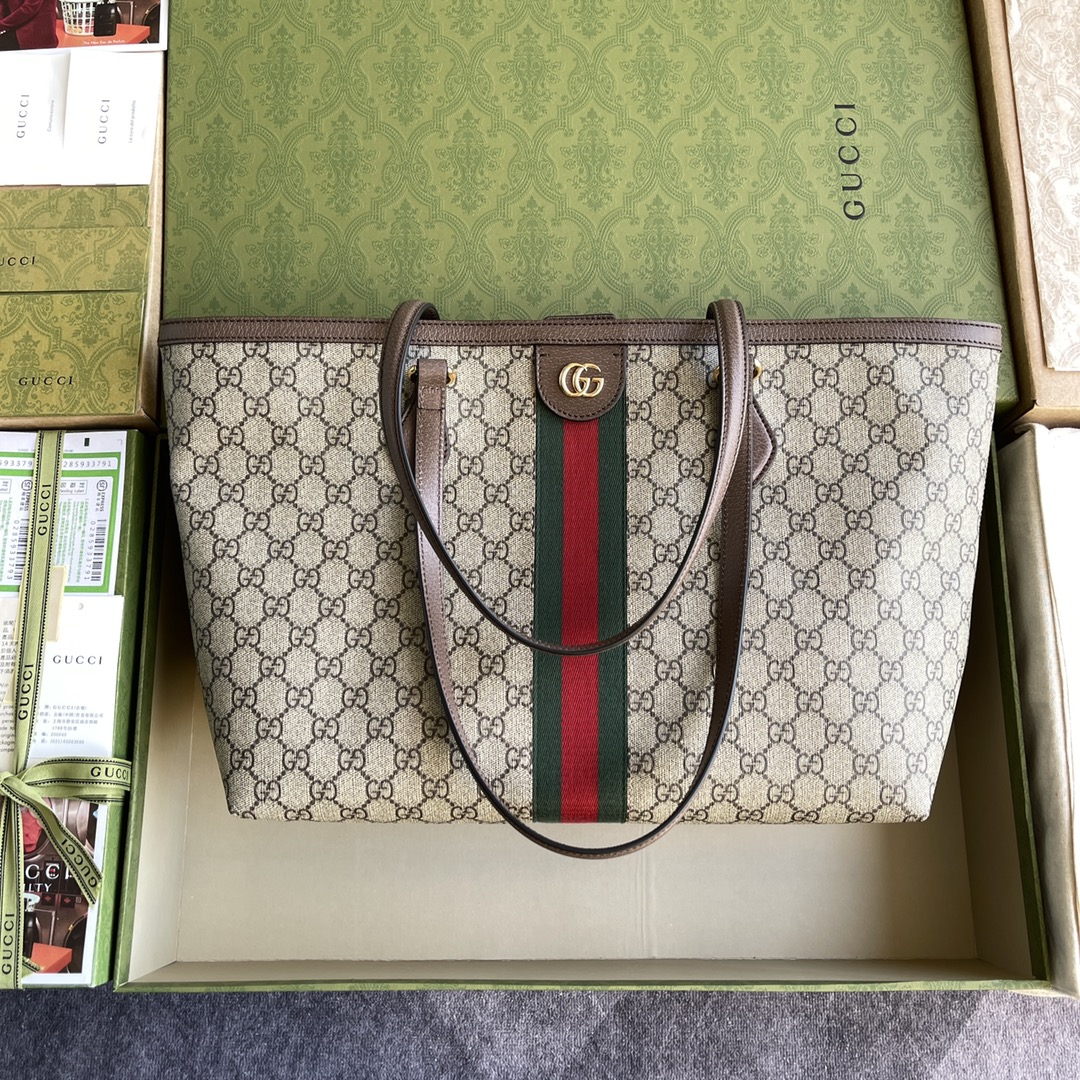 "Imported top-grade original leather"  
🌟 The Ophidia series combines two iconic classic brand elements: the GG pattern and striped webbing, refreshed each season with new shapes and materials. This new medium-sized tote features a practical new design with highly recognizable elements, trimmed with textured leather piping and topped with double G hardware. ✨  
Model: 631685  
Size: W38 x H28 x D14 cm image 1