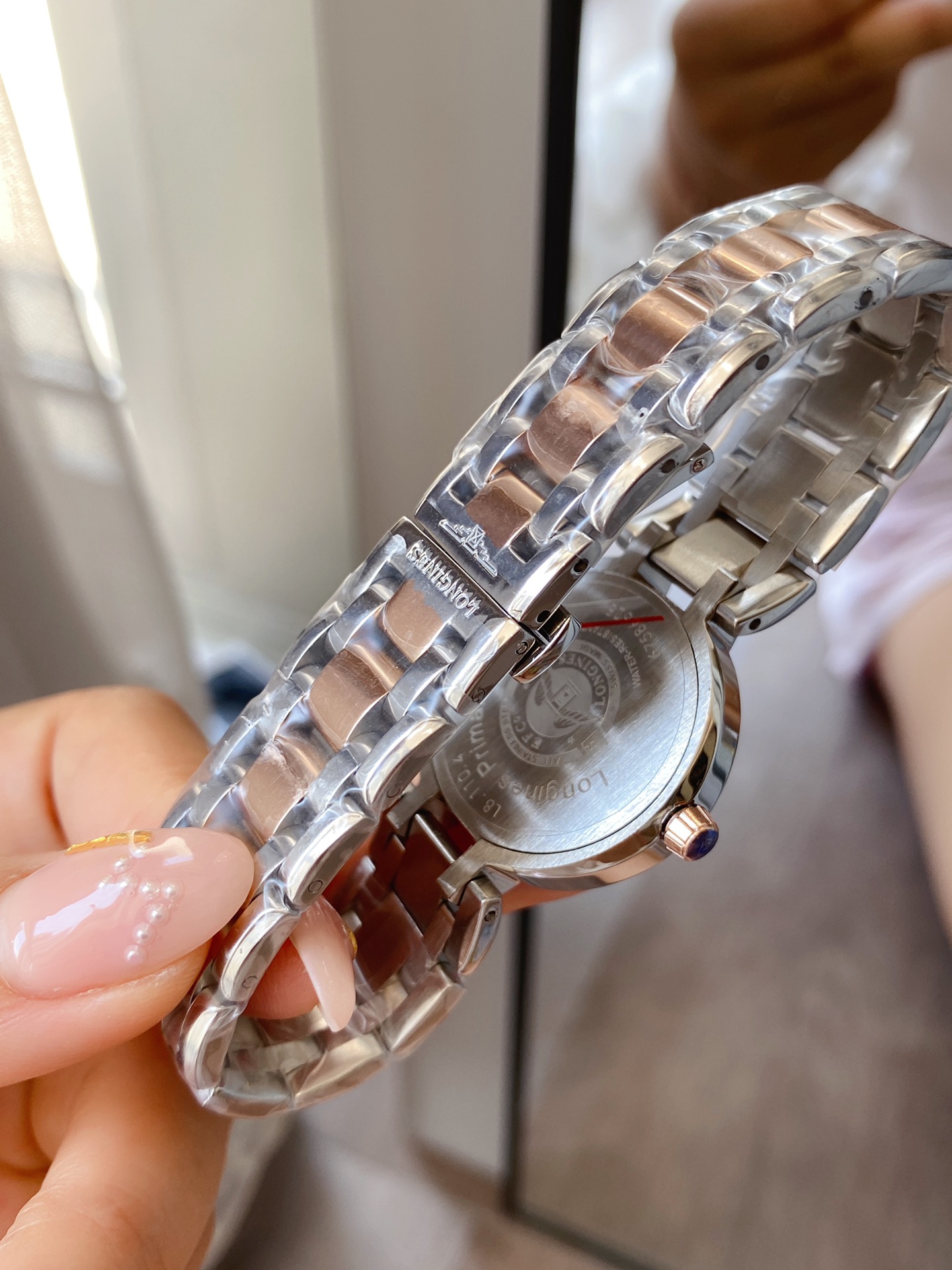 Longines Conquest Classic rose gold-tone case and bracelet, diamond bezel, blue dial 34mm Women's Quartz