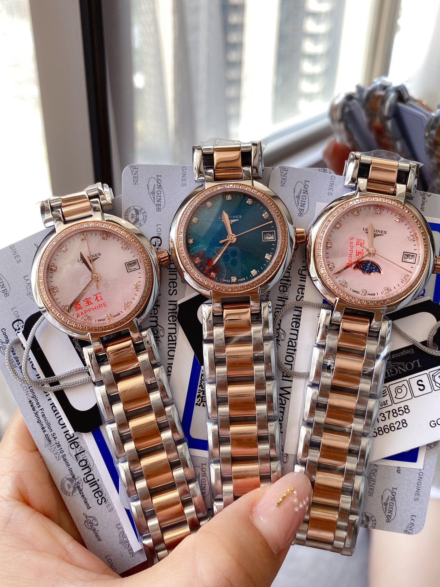 Longines Conquest Classic rose gold-tone case and bracelet, diamond bezel, blue dial 34mm Women's Quartz