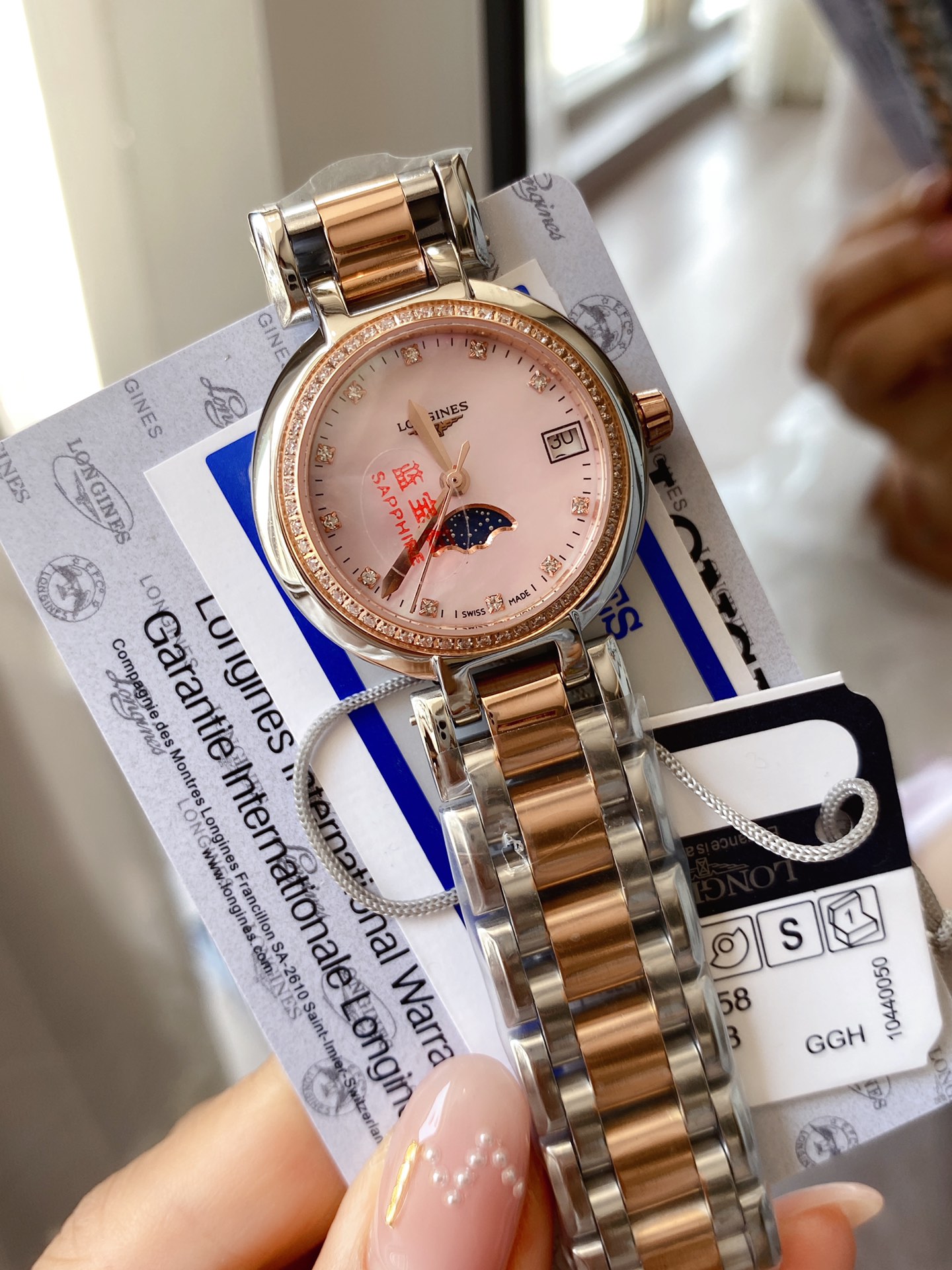 Longines Conquest Classic rose gold-tone case and bracelet, diamond bezel, blue dial 34mm Women's Quartz