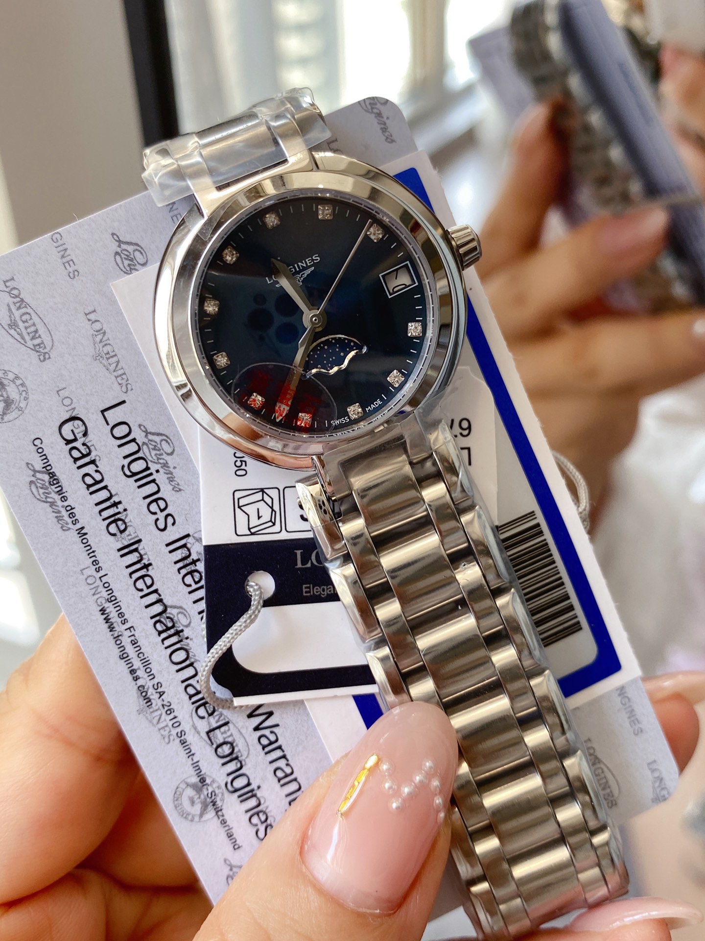 Longines Flagship steel case and bracelet, blue dial, silver bezel 35mm Women's Automatic