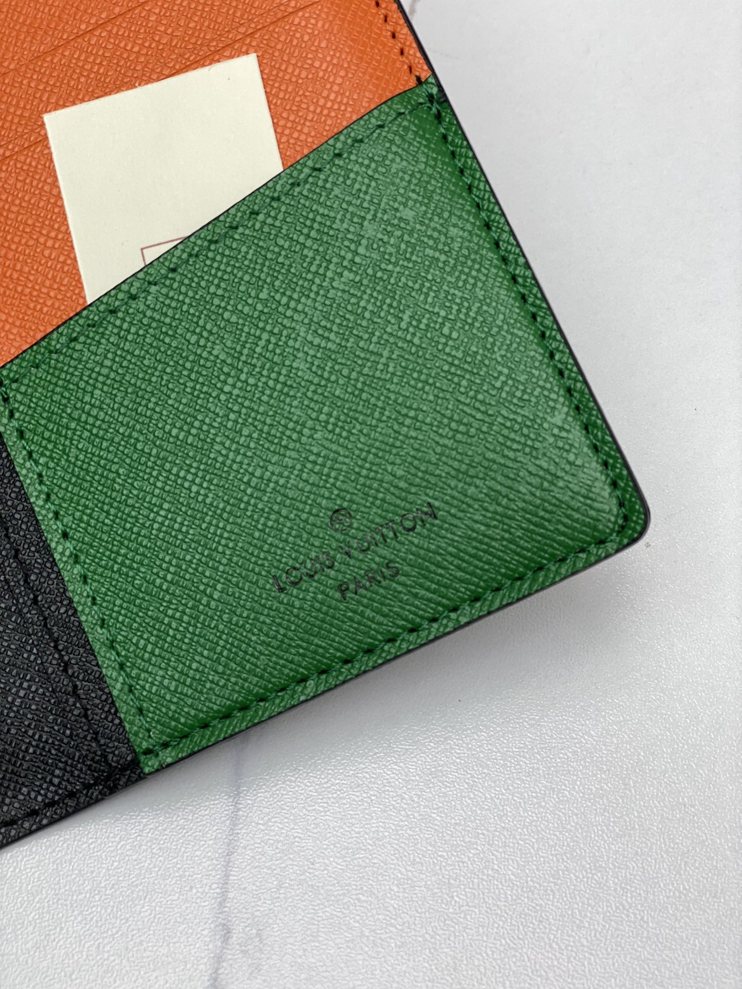 Leather wallet held in hand