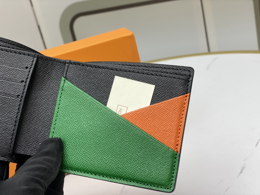 Close-up of stitching on the bifold leather wallet