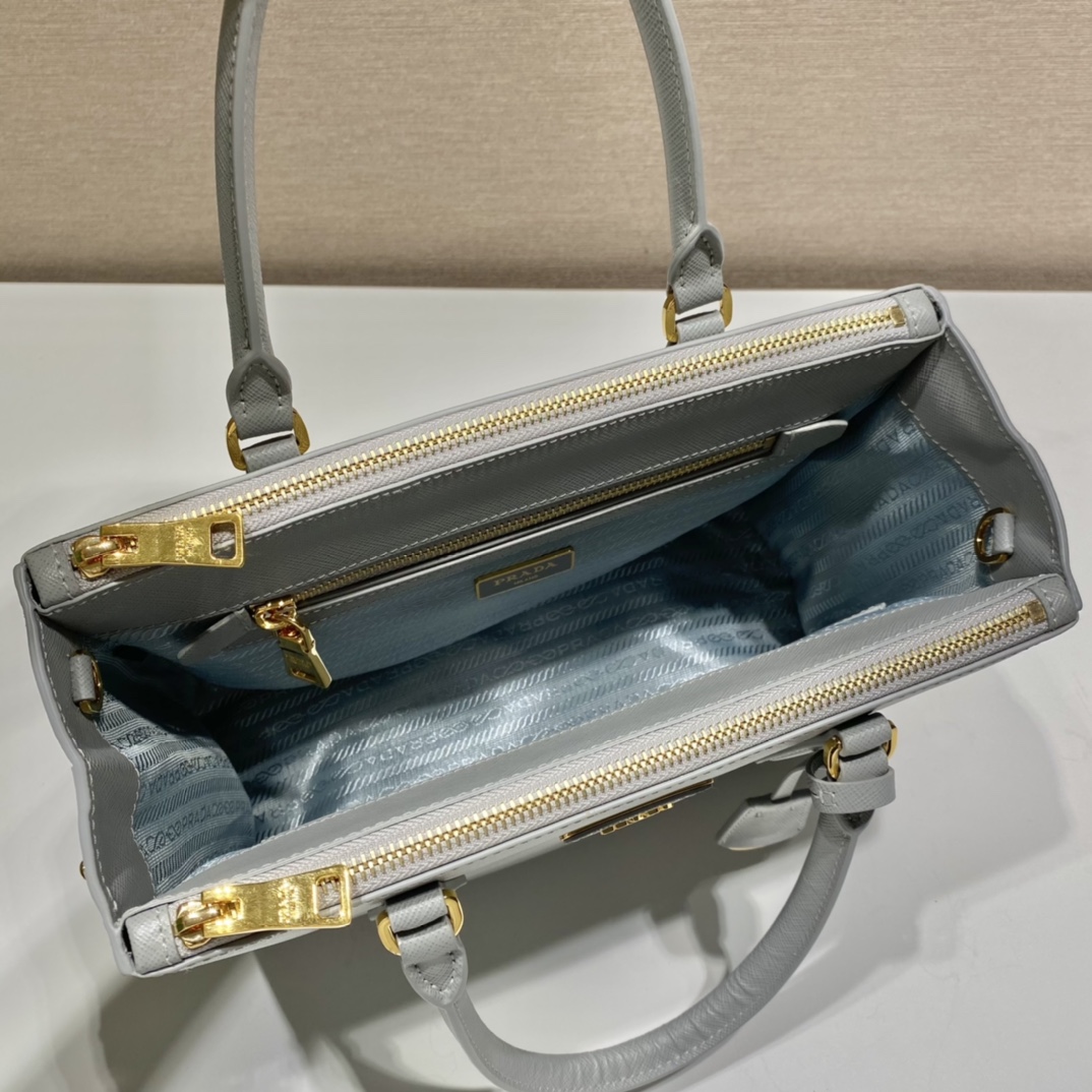 PRADA普拉达进口十字纹牛皮杀手包1BA863