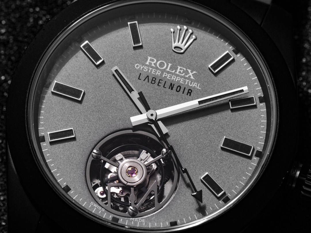 NO:337236,Rolex Label Noir Oyster Tourbillon, the first Rolex watch with tourbillon recognized by foreign media, is developed based on the data of the Milgauss Oyster 116400 Lightning Needle, the watchmaker conducted in-depth development based on the 3131 automatic mechanical movement, removed 51 components, then added 94 new components, and modified 2 components, equipped with the first Big Second Seagull Tourbillon movement, which is another technological breakthrough in the COPY industry. The final result is that it has the world's first Rolex real tourbillon watch. The steel case was black PVD, the dial was changed to matte gray, the hands and hour markers were also black, and the folding buckle like Rolex Oyster  In short, the bright Oyster's literals are replaced with low-key and high-end dark colors, which will focus your attention on the tourbillon at 6 o'clock. The inscription 