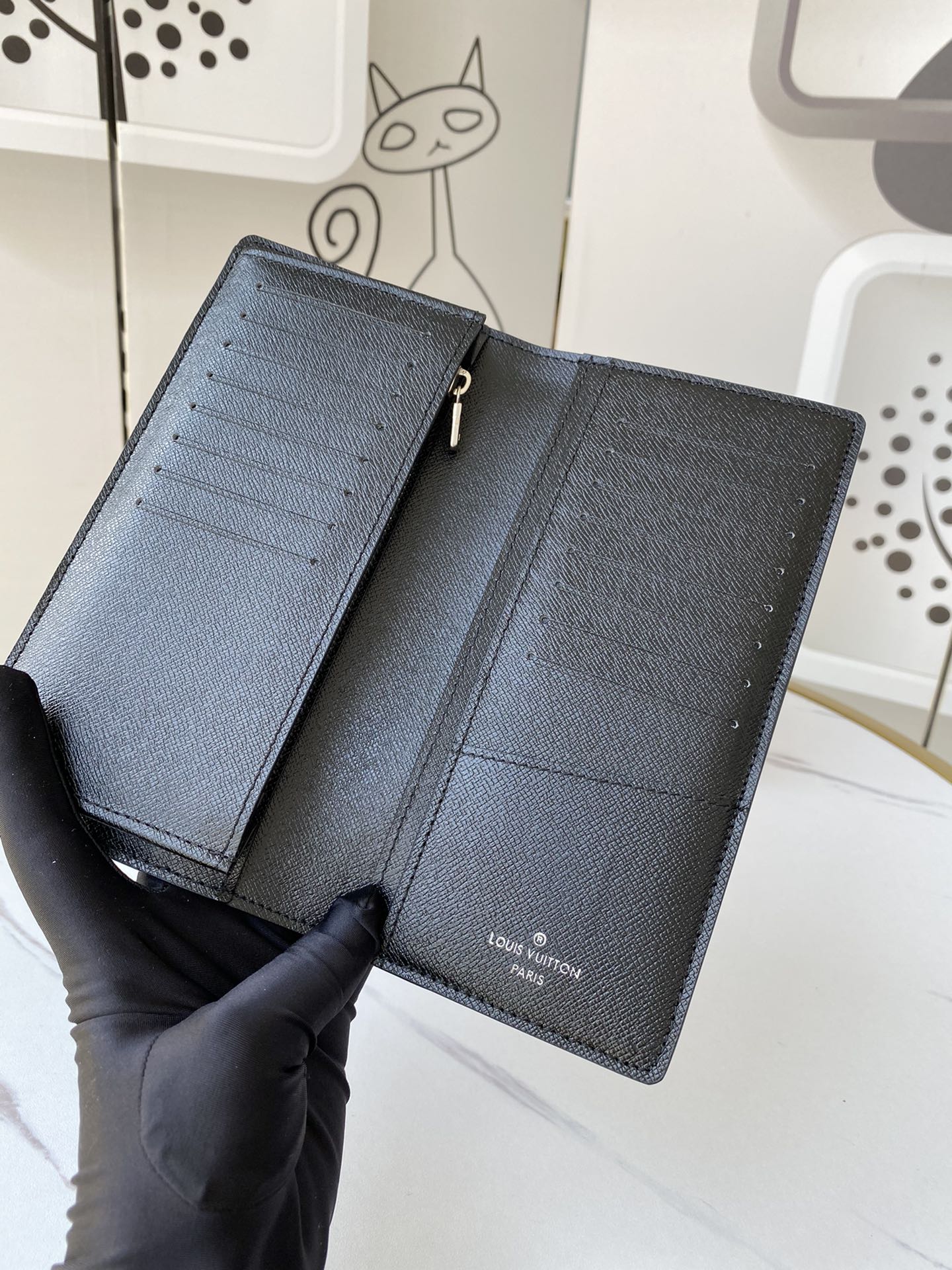 Leather wallet shown from different angles