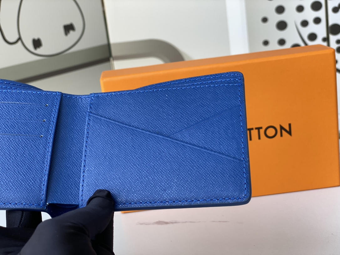 Close-up of stitching on the bifold leather wallet