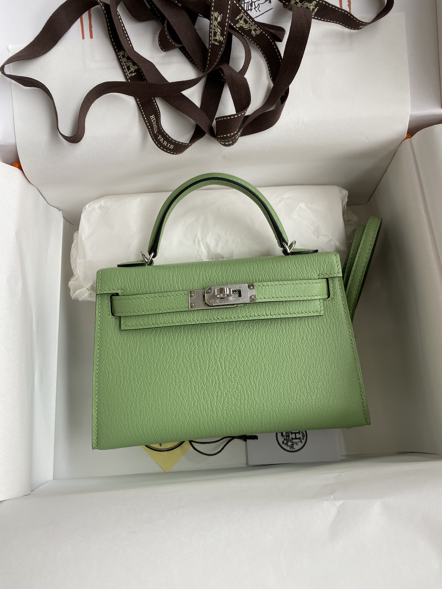 Hermès In stock: Second generation Mini Kelly 19cm imported goatskin, avocado green silver buckle