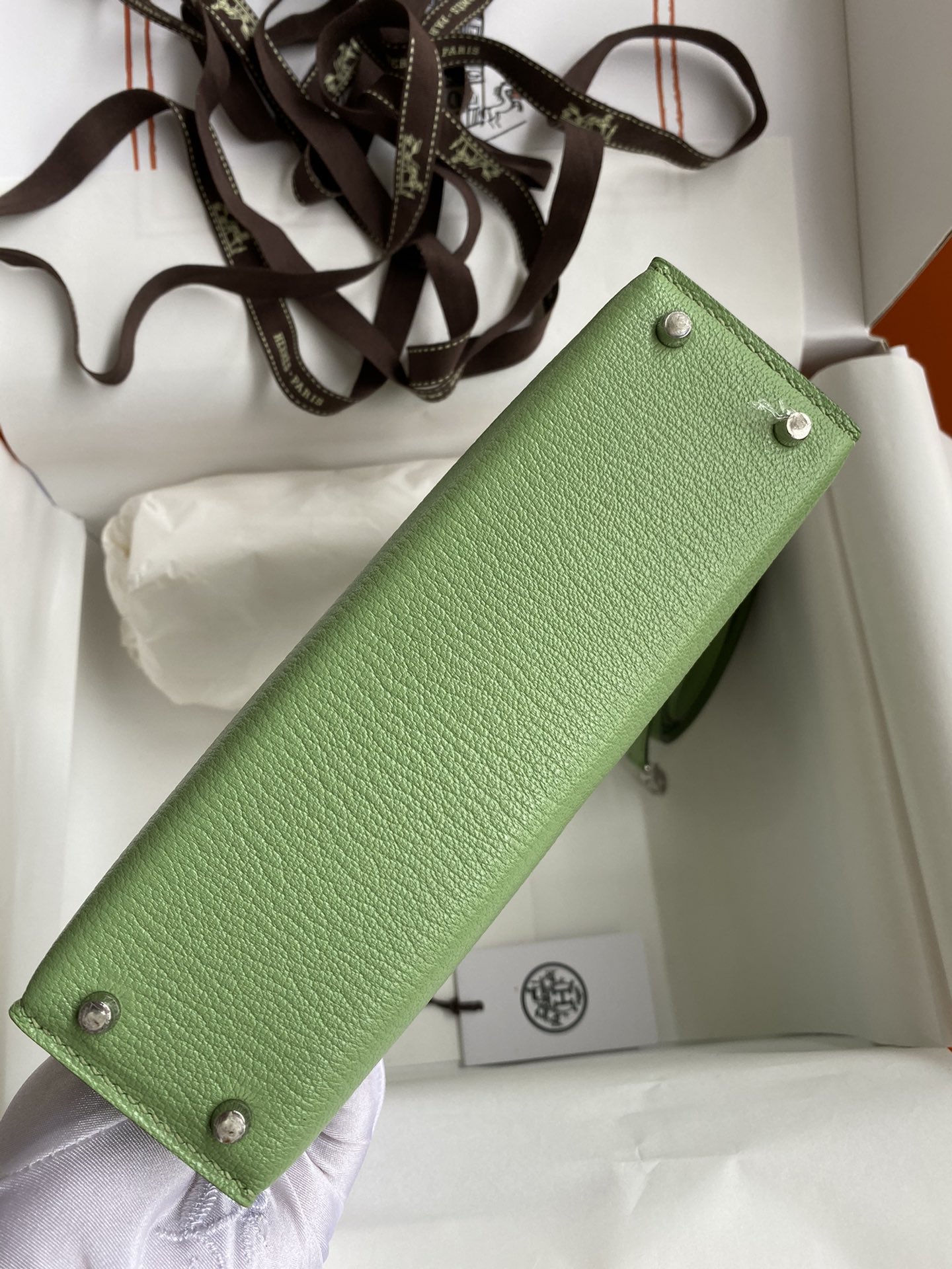 Hermès In stock: Second generation Mini Kelly 19cm imported goatskin, avocado green silver buckle