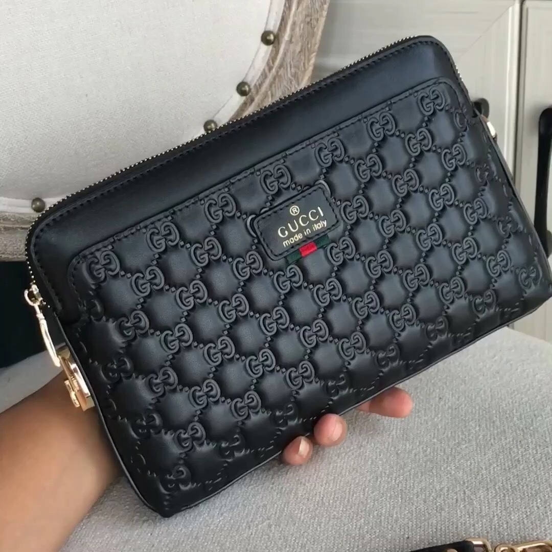 最爆款 古奇  Gucci 密码锁头层牛皮压格男士休闲手拿包大量出货