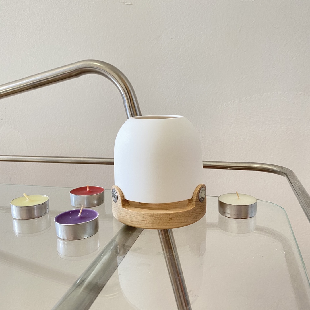 this Hermès classic candle lantern is paired with a matte-textured white - Comprehensive 7