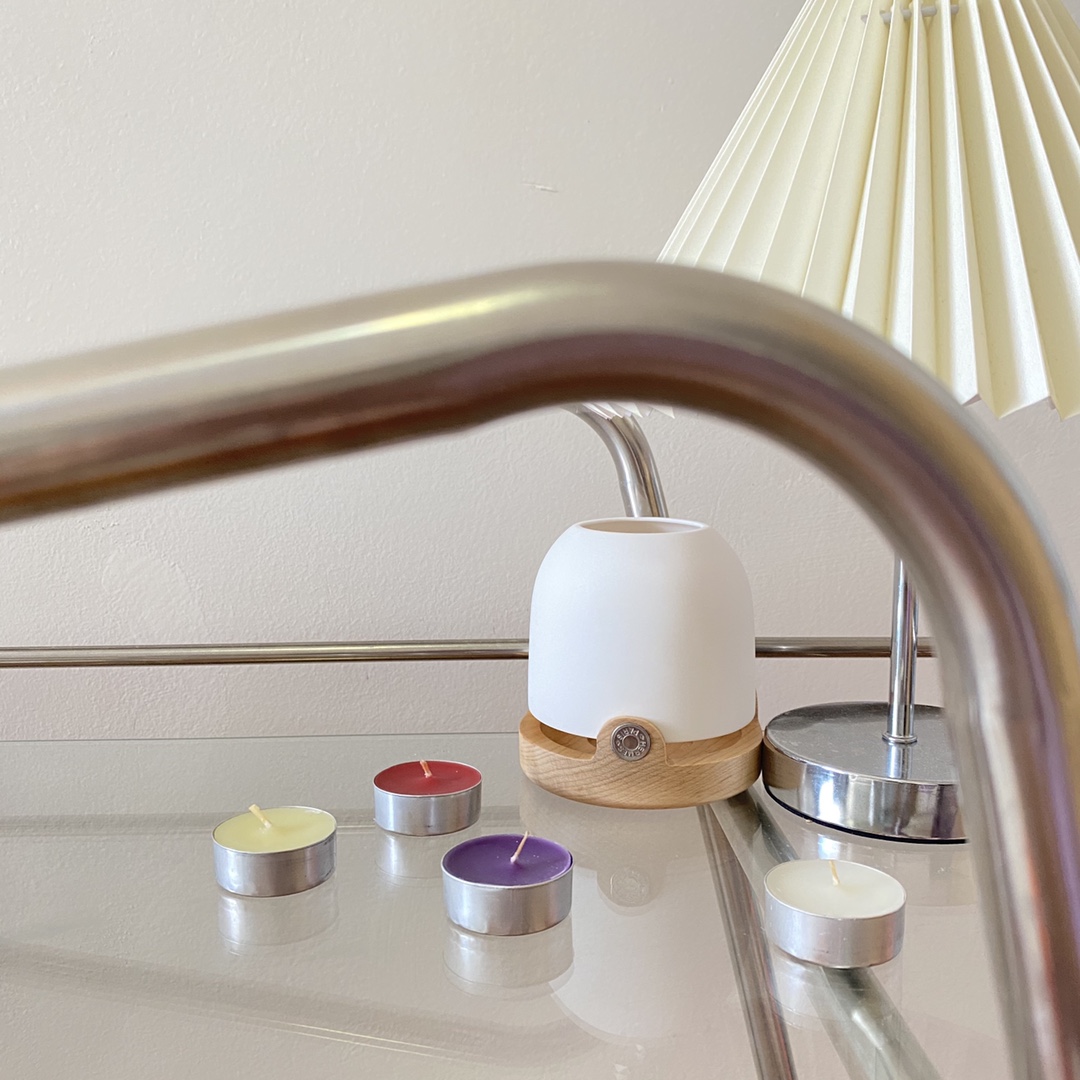 this Hermès classic candle lantern is paired with a matte-textured white - Comprehensive 8