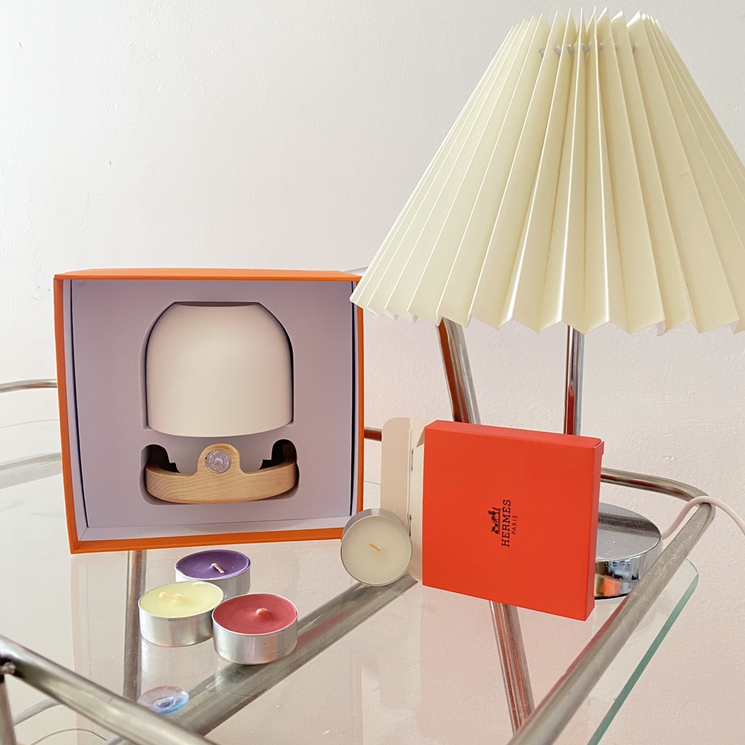 this Hermès classic candle lantern is paired with a matte-textured white - Comprehensive 4