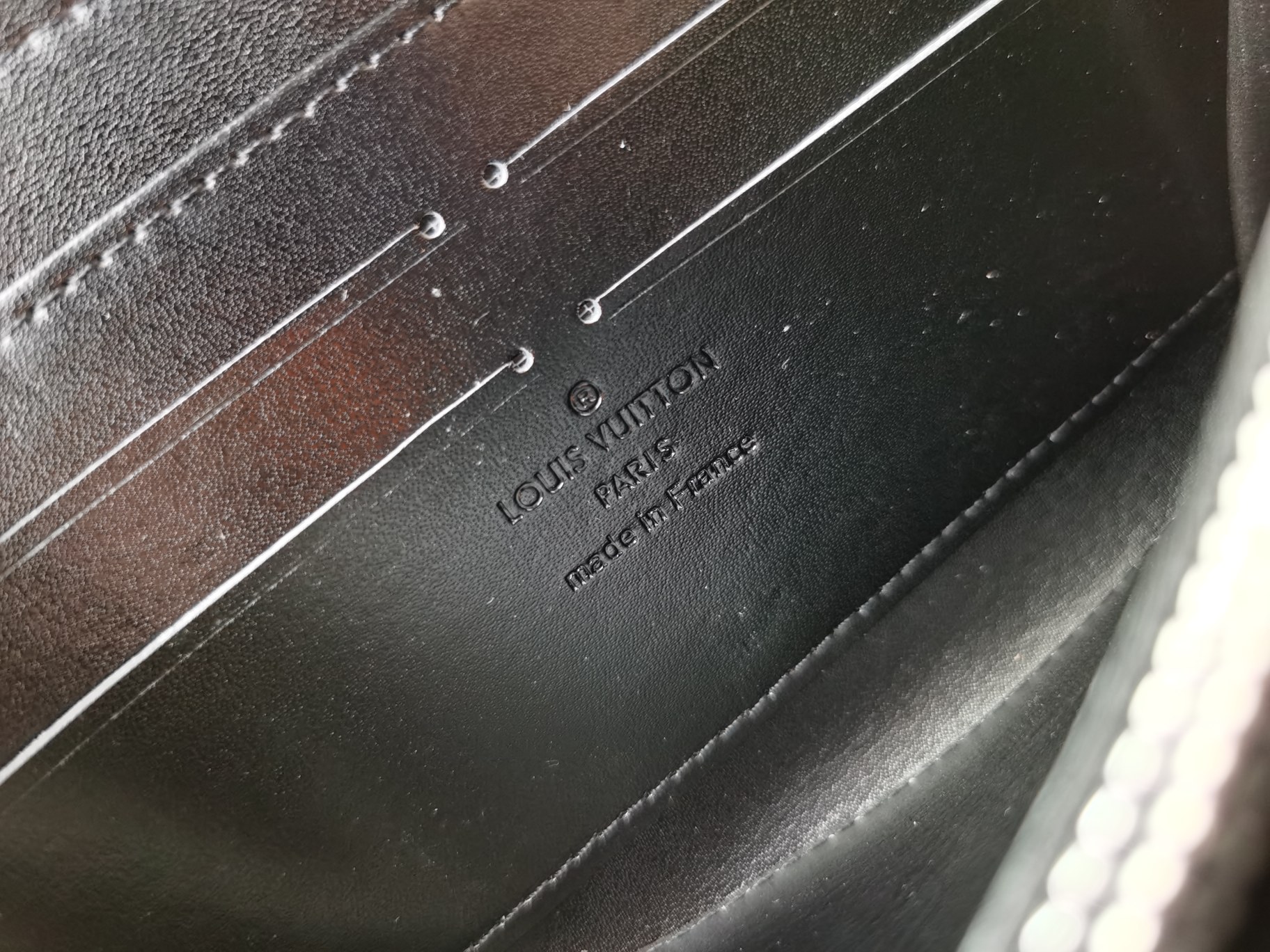 モノグラム帆布ラウンドファスナー財布 M60017 ブラック