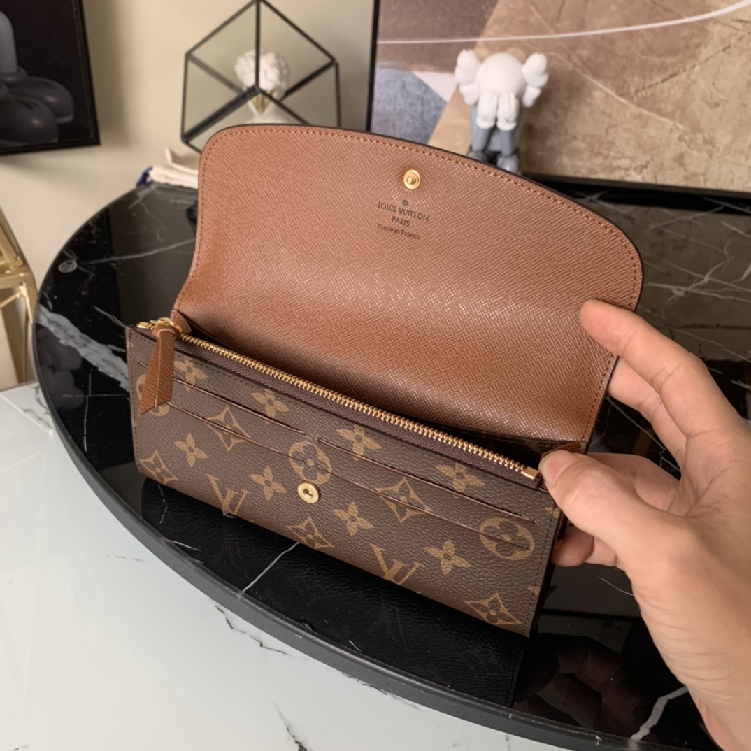 M60697啡色！功能实用且设计华美的Emilie钱夹采用柔软的Monogram帆布制成衬以颜色鲜艳的内
