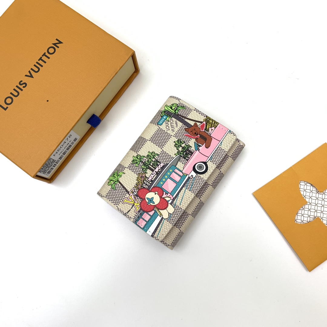 The compact "Victorine Wallet" is crafted from Damier Azur canvas - Bag 3