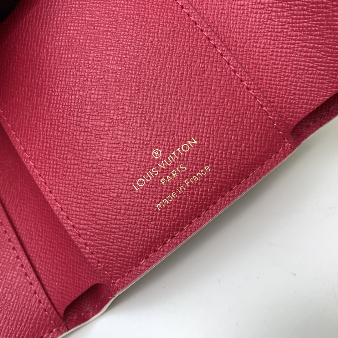 The compact "Victorine Wallet" is crafted from Damier Azur canvas - Bag 6