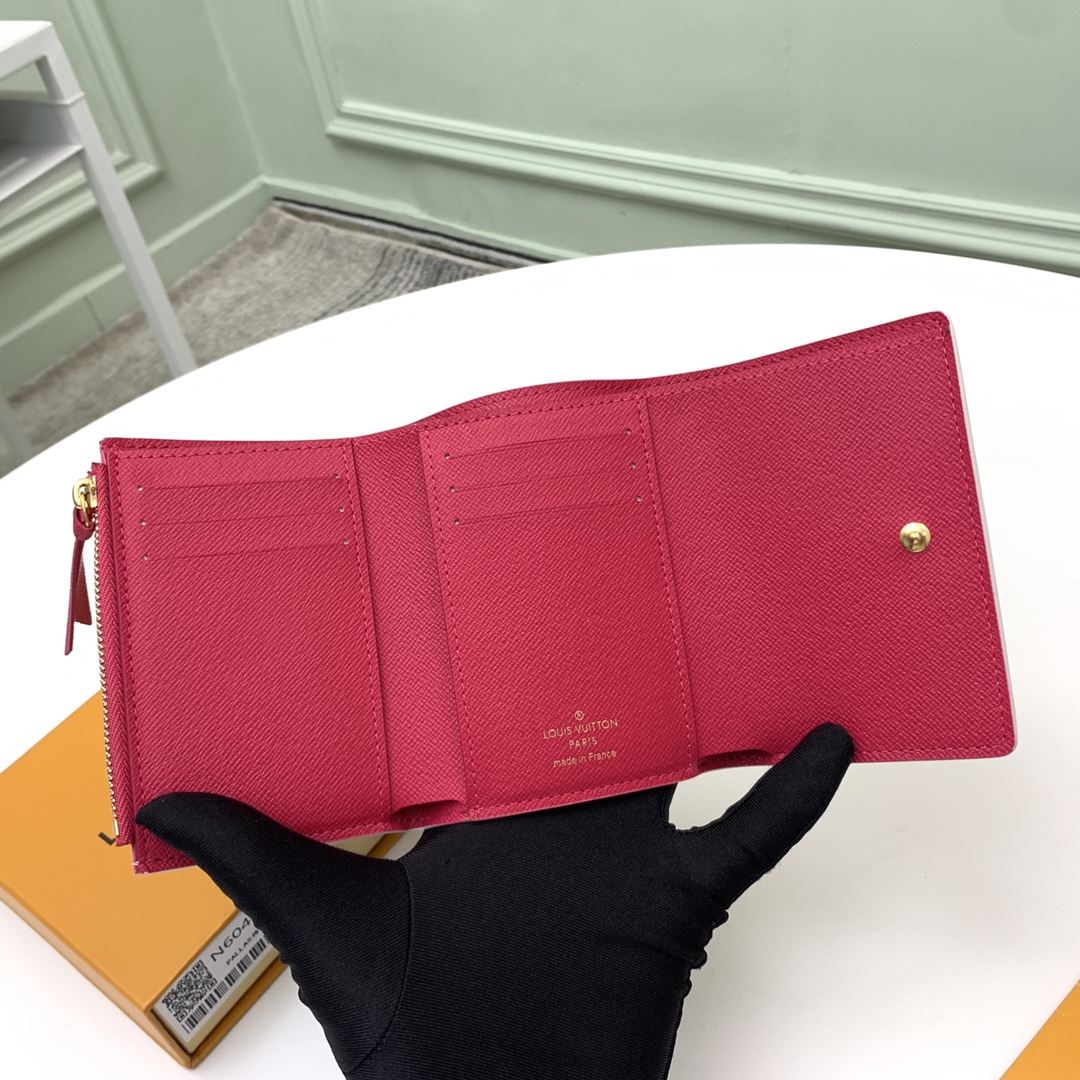 The compact "Victorine Wallet" is crafted from Damier Azur canvas - Bag 5