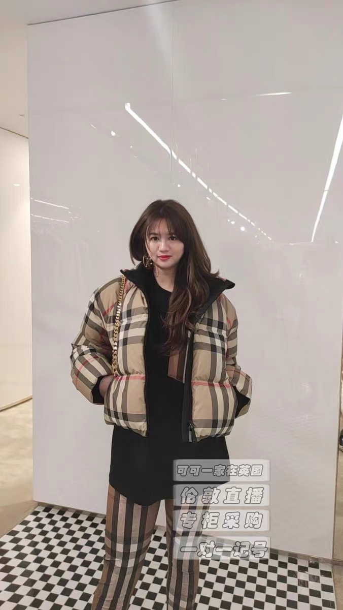 Top-grade Burberry plaid women's down jacket. Filled with 90% premium down for excellent warmth. High-density polyester with quilted design. Stand collar, zipper, and pockets. Sizes: S, M, L.-Big cat