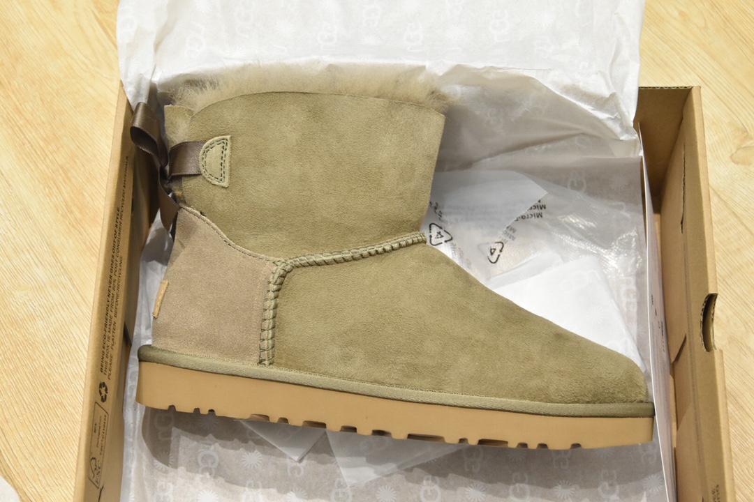 H5 最新公司级改版6501 Mini Bailey Bow II 迷你贝莉蝴蝶结2.017毫米皮毛一体羊皮，表面预先做过防泼水防污涂层处理TREADLITE BY UGG™ 轻翼科技外底-优质的防滑，缓冲，耐磨性，和良好的弹性