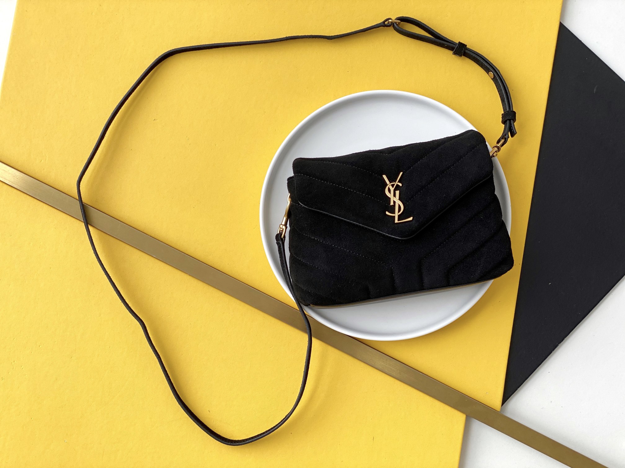 Black suede single-shoulder crossbody bag gold hardware flap compartment