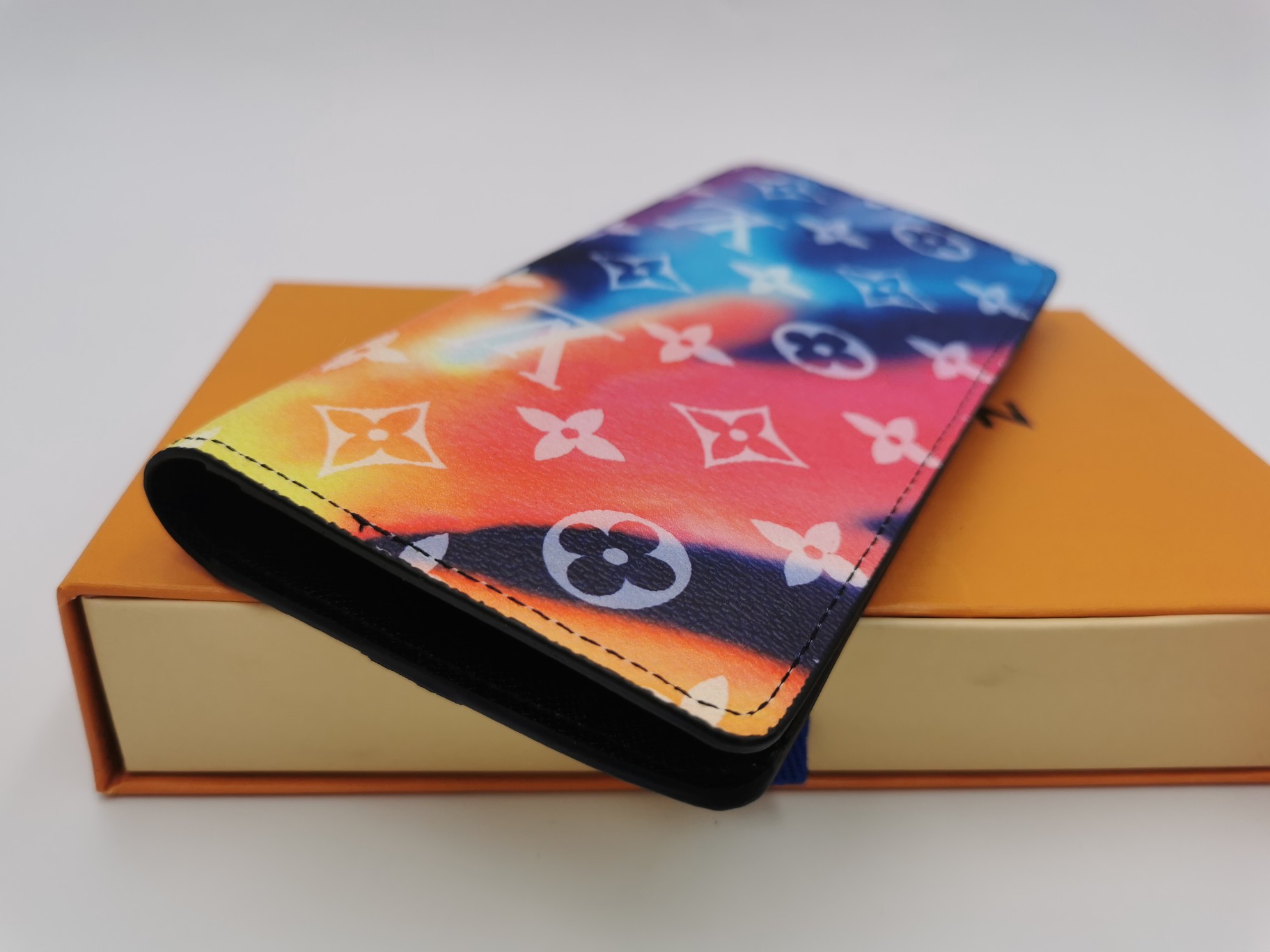 Leather wallet shown from different angles