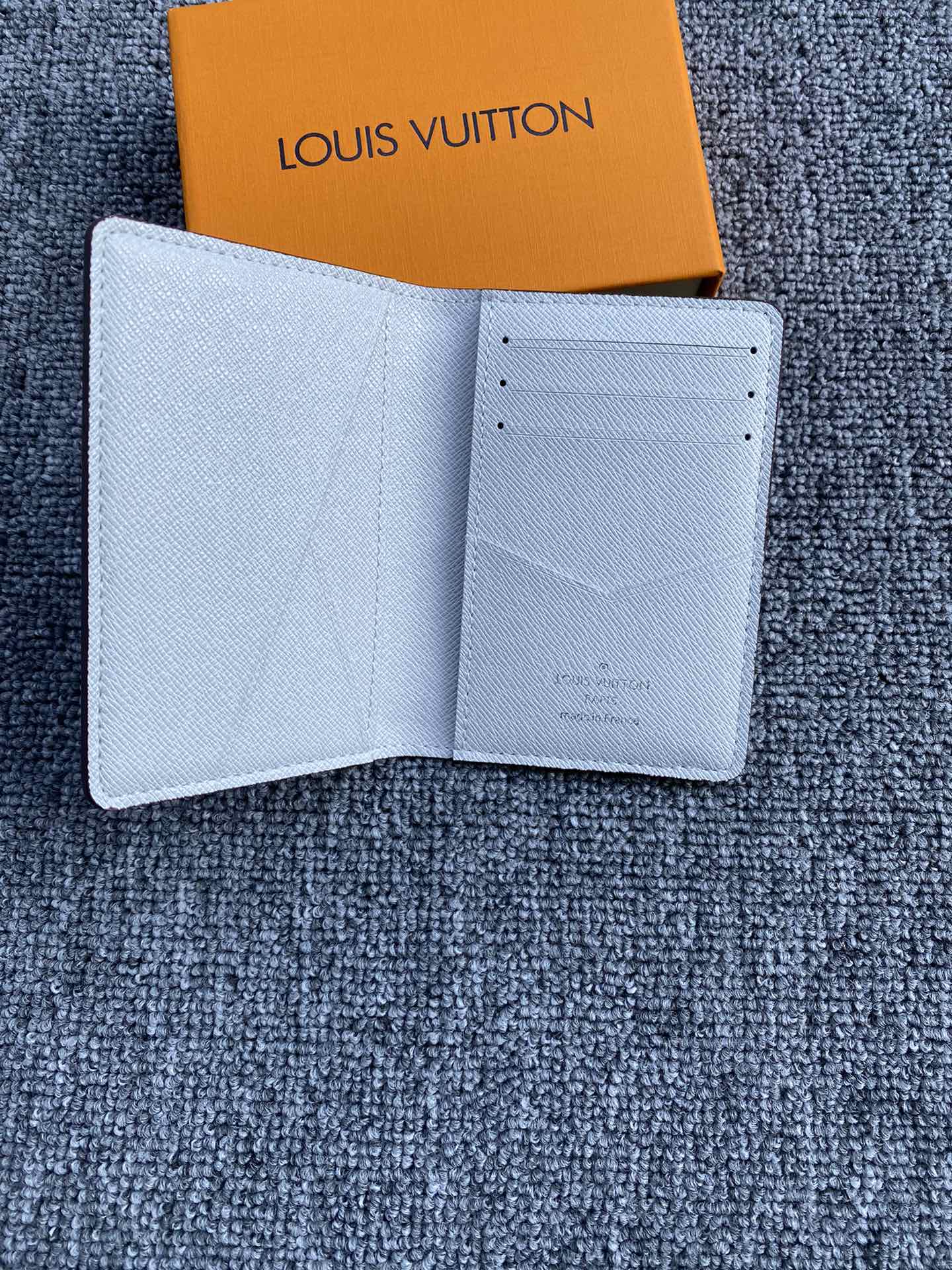 Card organizer in a person's hand