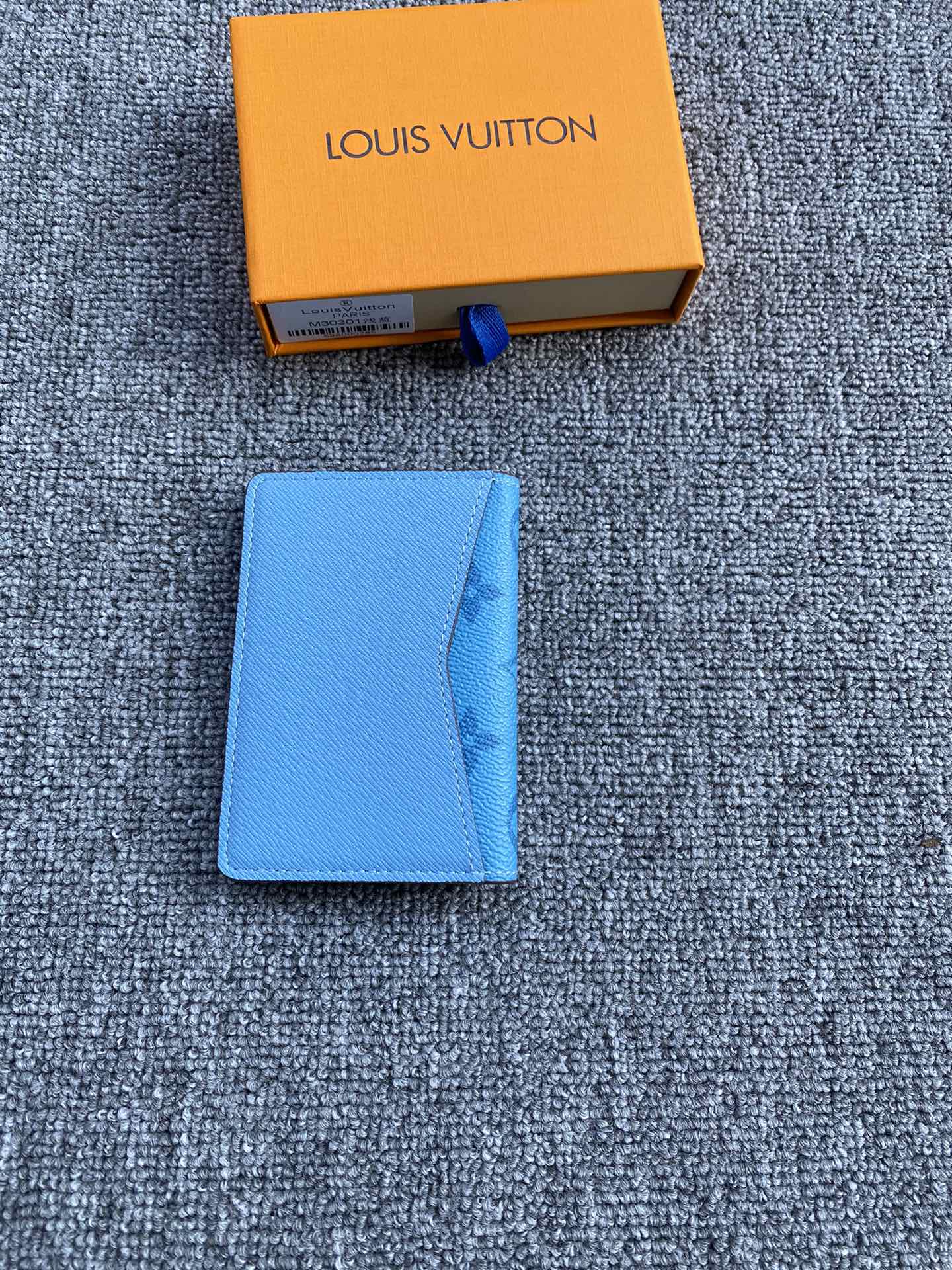 Premium leather card holder open showing card slots